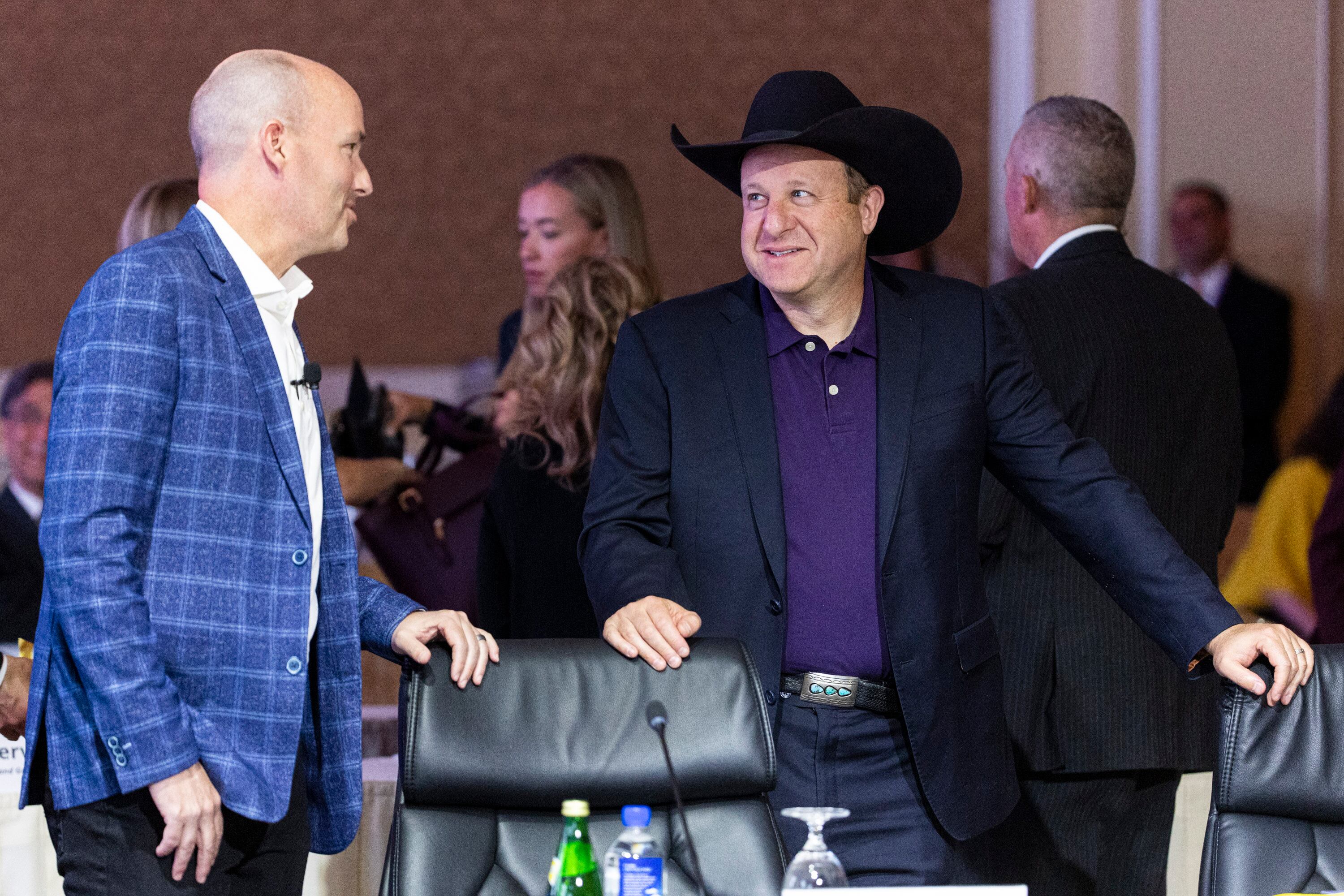 Utah Gov. Spencer Cox talks with Colorado Gov. Jared Polis before opening remarks of an event concerning the "Disagree Better" initiative as part of the National Governors Association’s 2024 Summer Meeting held at the Grand America Hotel in Salt Lake City on Thursday.