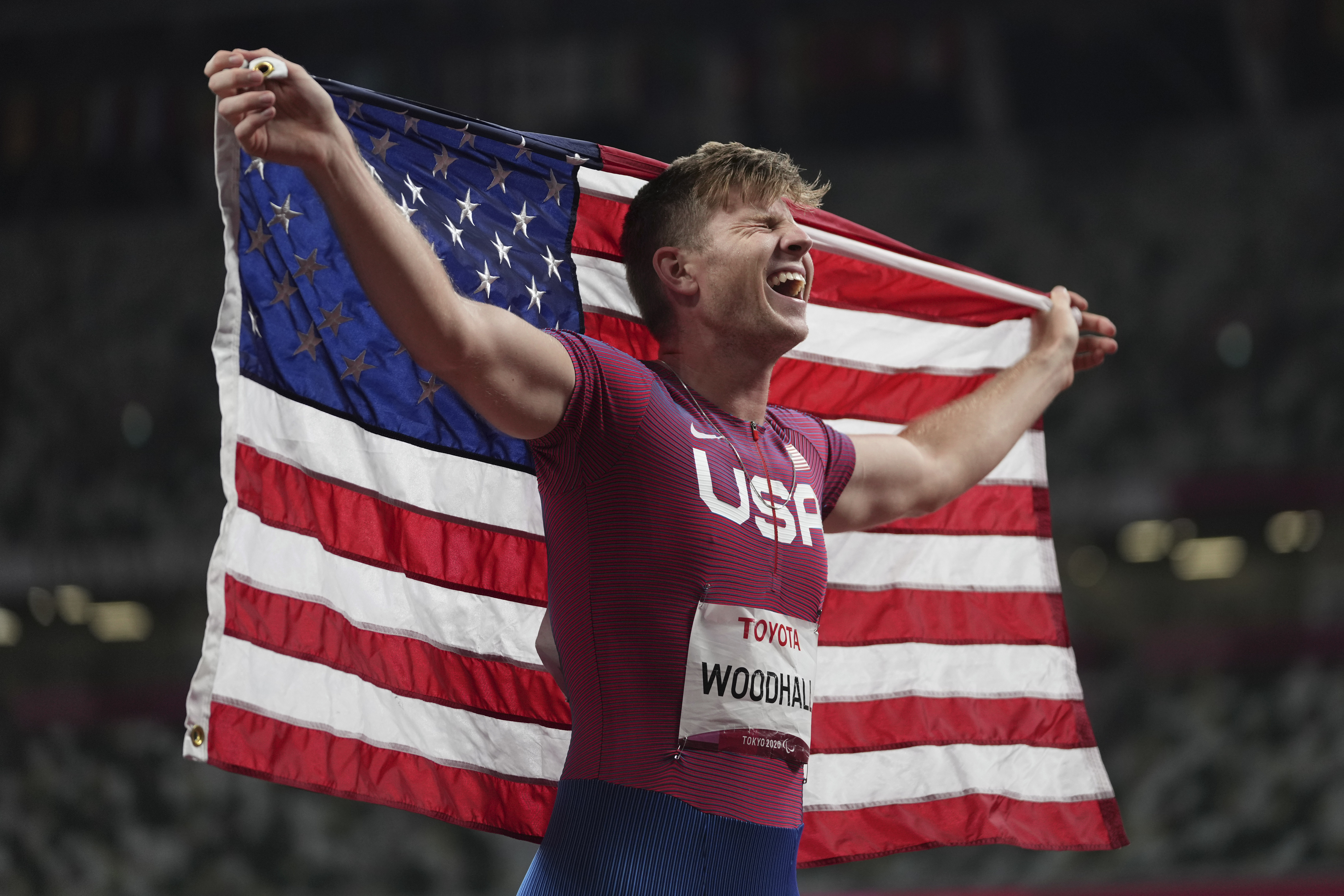 Hunter Woodhall of the U.S. celebrates after finishing third during the men's T62 400m final at the Tokyo 2020 Paralympic Games, Friday, Sept. 3, 2021, in Tokyo, Japan. This year, the year of the Paris Olympics and Paralympics, is not about coming close or showing up unprepared.