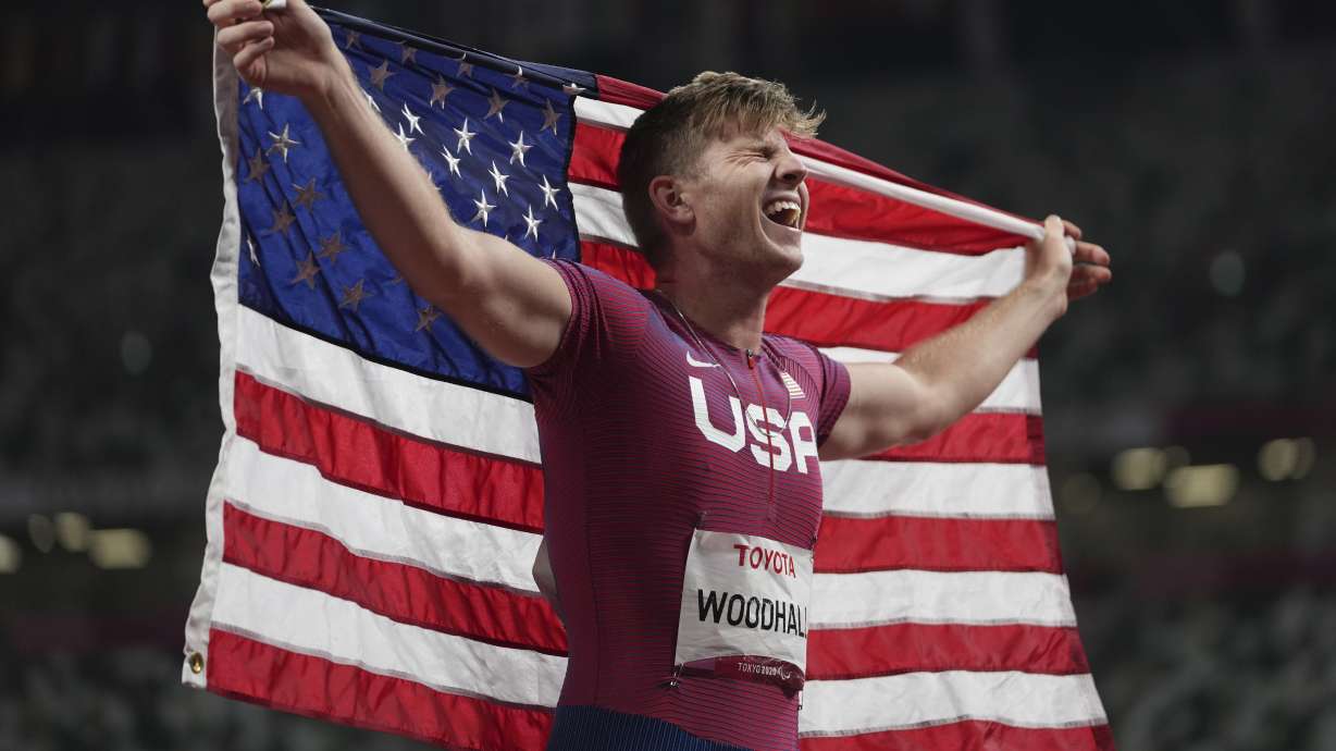 Hunter Woodhall of the U.S. celebrates after finishing third during the men's T62 400m final at the Tokyo 2020 Paralympic Games, Friday, Sept. 3, 2021, in Tokyo, Japan. This year, the year of the Paris Olympics and Paralympics, is not about coming close or showing up unprepared.
