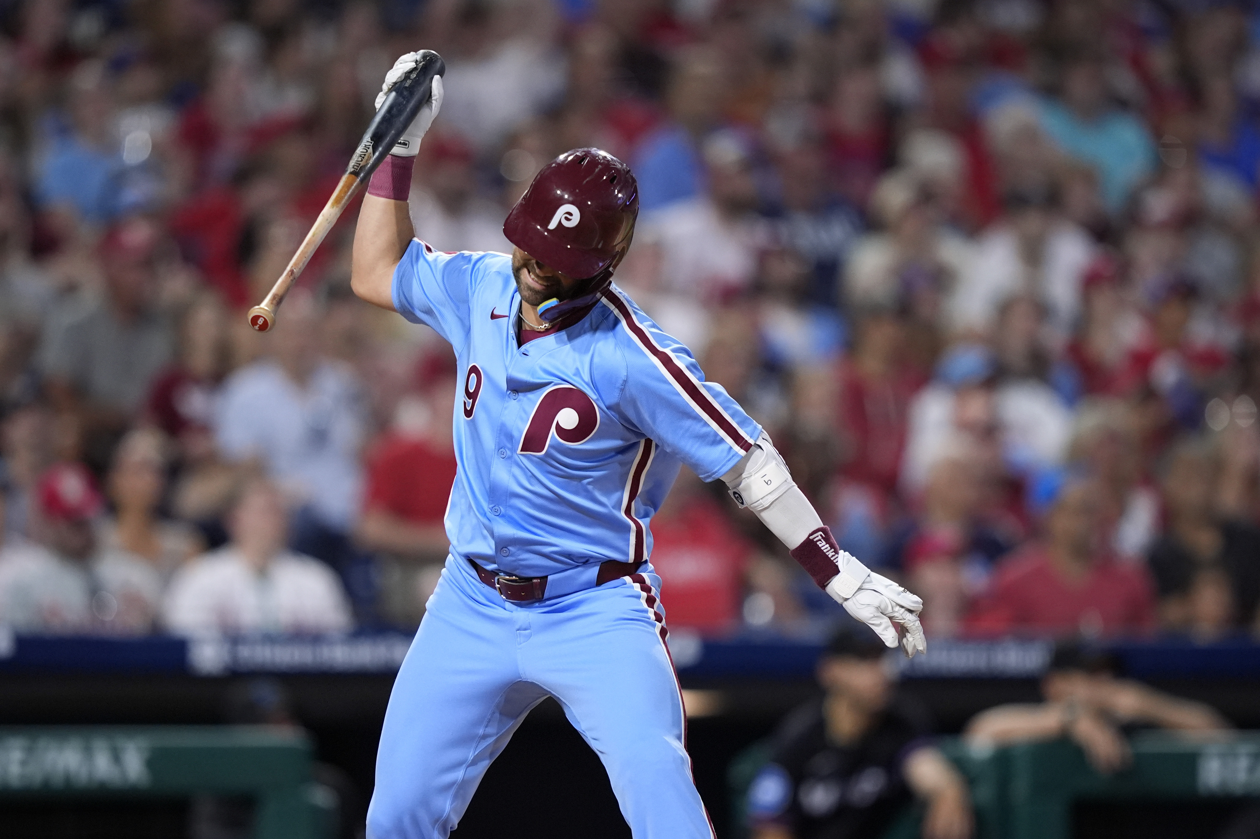 Philadelphia Phillies' Whit Merrifield reacts after flying out against Miami Marlins pitcher A.J. Puk during the eighth inning of a baseball game, Thursday, June 27, 2024, in Philadelphia. 