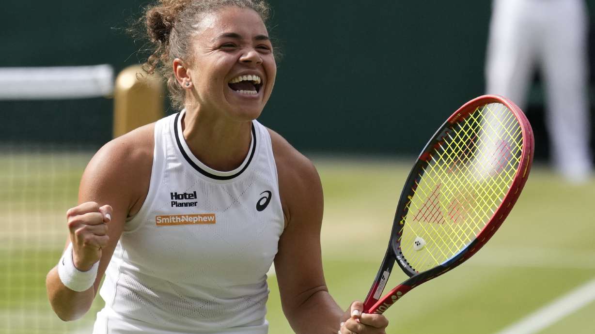 Jasmine Paolini of Italy celebrates after defeating Donna Vekic of Croatia in their semifinal match at the Wimbledon tennis championships in London, Thursday, July 11, 2024.