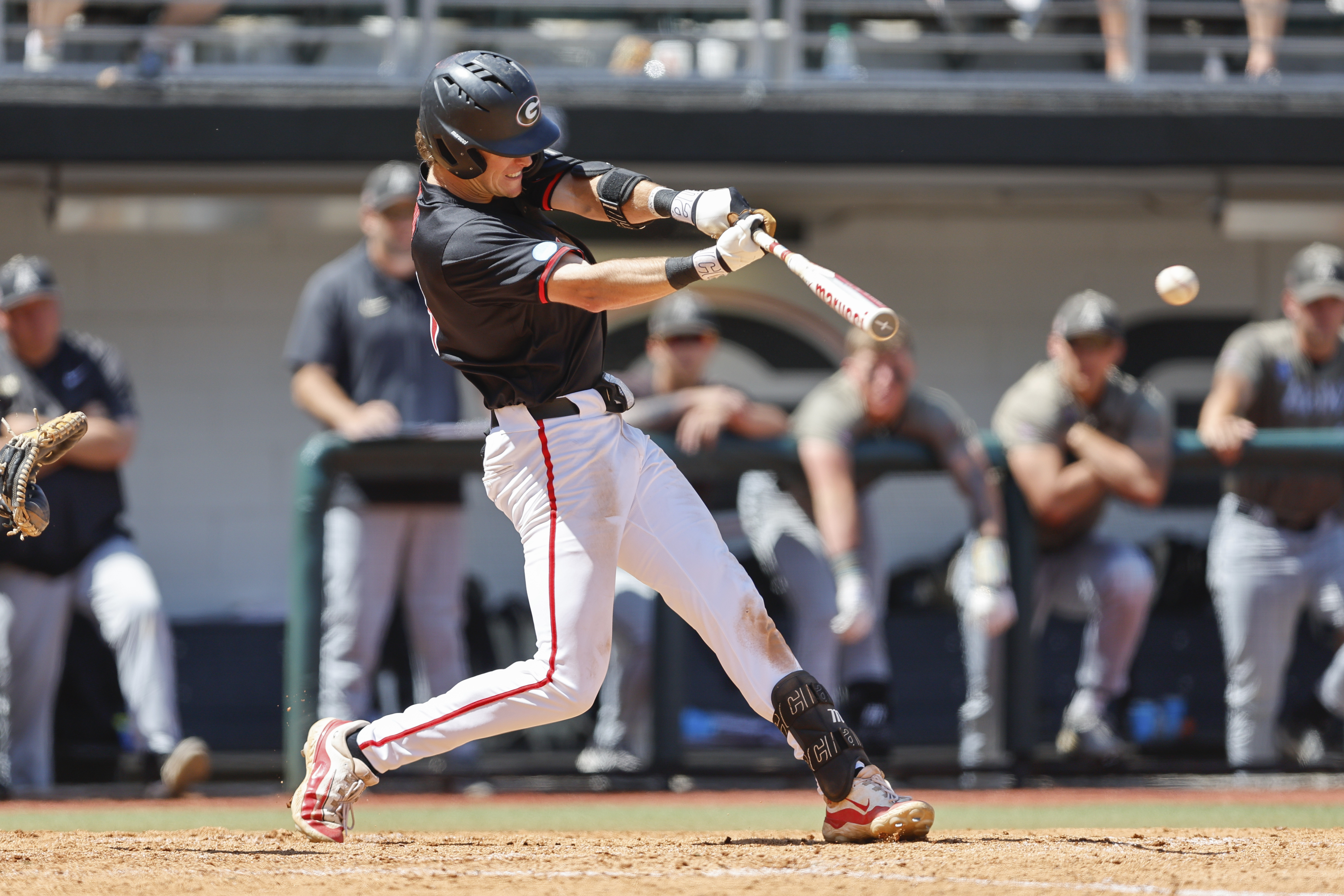 FILE - Georgia's Charlie Condon hits the ball during an NCAA regional baseball game against Army on May 31, 2024 in Athens, Ga. The Cleveland Guardians have the No. 1 overall pick in next week's draft. They have narrowed the talent pool to just a few possibilities with Oregon State second baseman Travis Bazzana, Georgia outfielder/third baseman Condon and West Virginia middle infielder Wetherholt believed to be the frontrunning options. 