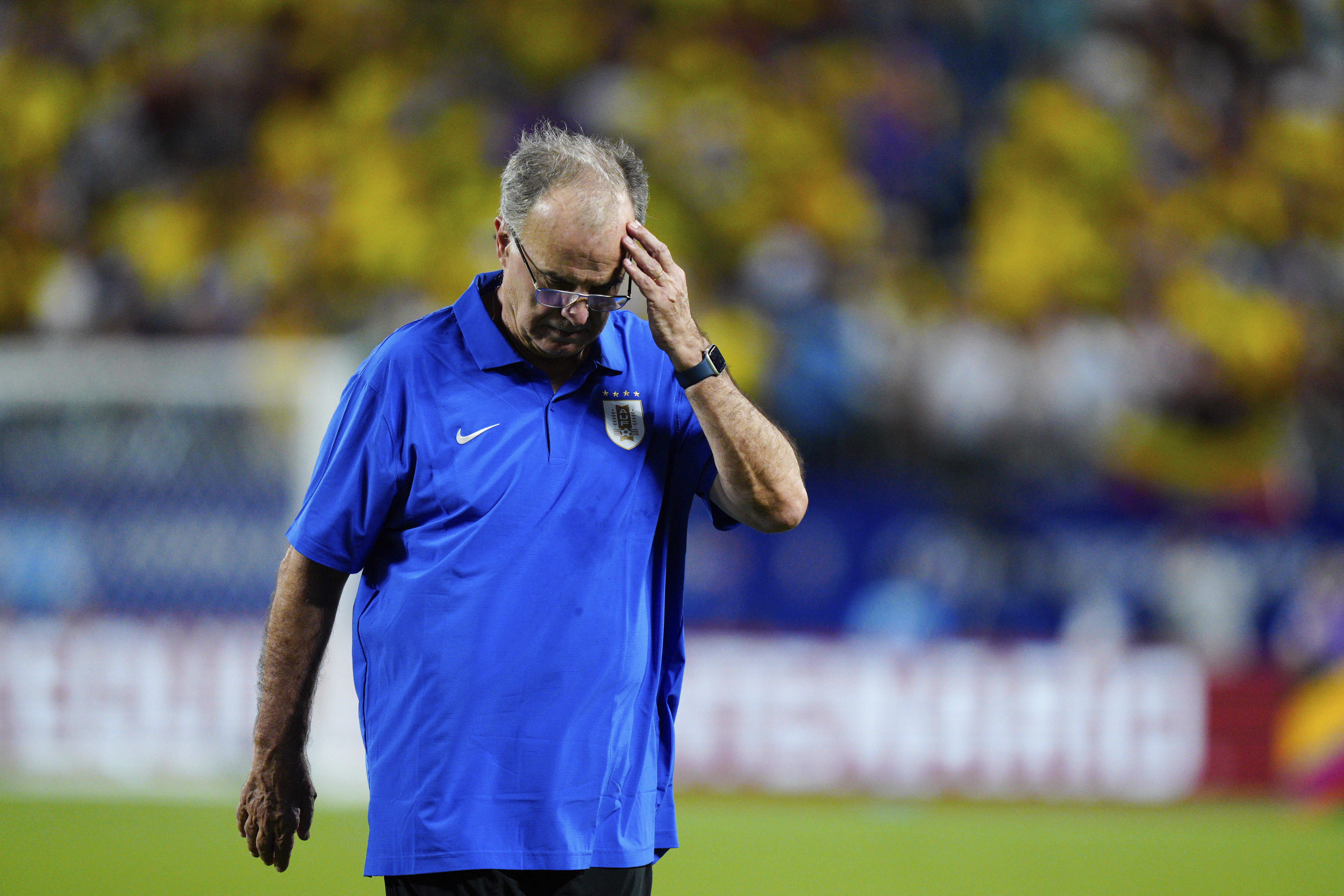 Uruguay's coach Marcelo Bielsa reacts after his team's 1-0 loss against Colombia in a Copa America semifinal soccer match in Charlotte, N.C., Wednesday, July 10, 2024.