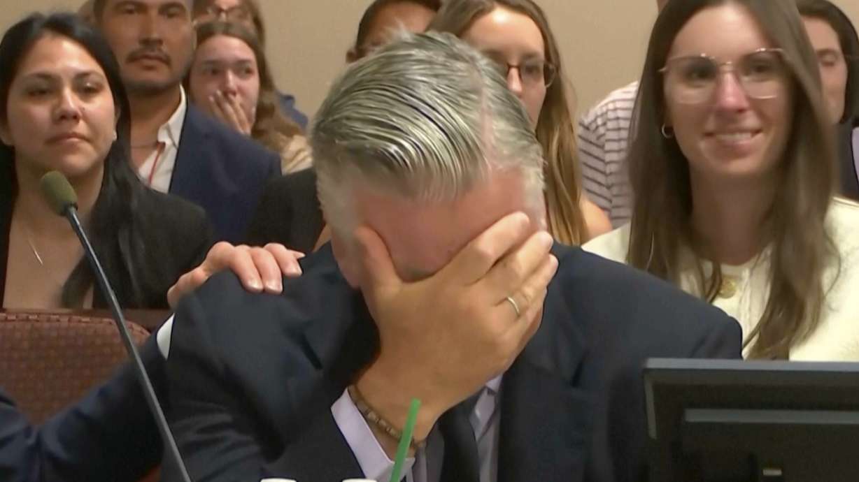 Actor Alec Baldwin reacts after the judge threw out the involuntary manslaughter case for the 2021 fatal shooting of cinematographer Halyna Hutchins during filming of the Western movie "Rust," Friday, at Santa Fe County District Court in Santa Fe, N.M.
