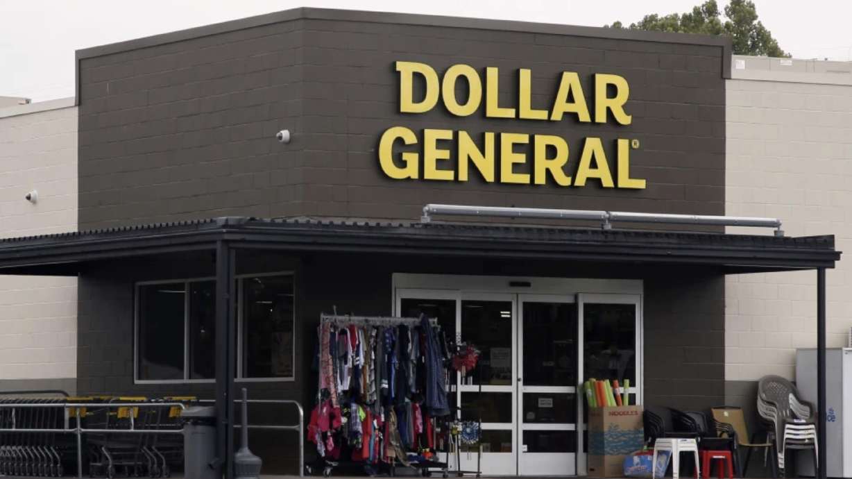 A Dollar General store is seen in Luther, Okla. Dollar General has agreed to pay a $12 million fine and to improve conditions at its thousands of retail stores nationwide to make them safer for workers, the U.S. Department of Labor said Thursday.