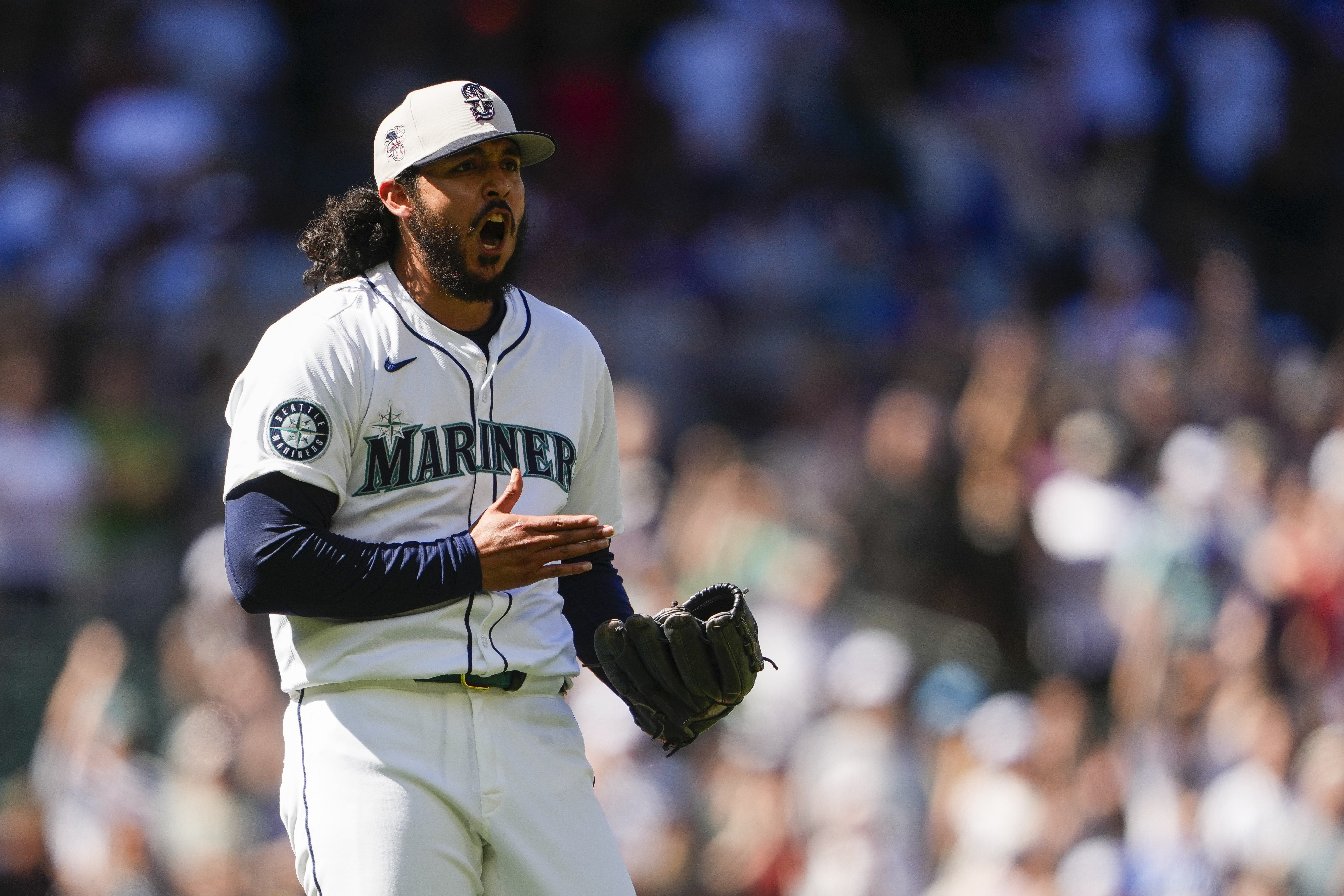 Seattle Mariners relief pitcher Andrés Muñoz reacts after the final out in a win over the Baltimore Orioles in a baseball game Thursday, July 4, 2024, in Seattle. 