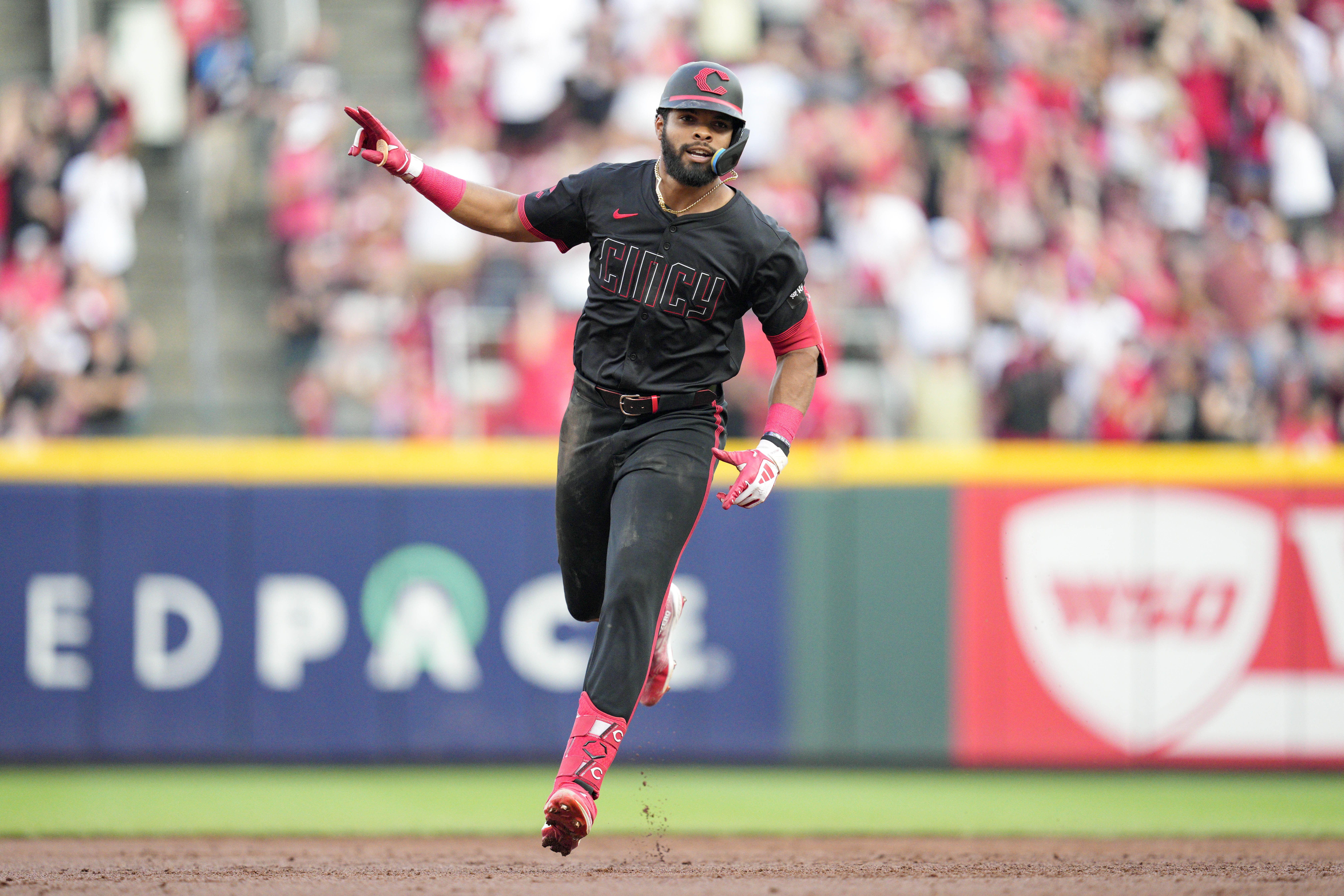 Cincinnati Reds' Rece Hinds rounds the bases after hitting his career first MLB grand slam during the third inning of a baseball game against the Miami Marlins, Friday, July 12, 2024, in Cincinnati. 