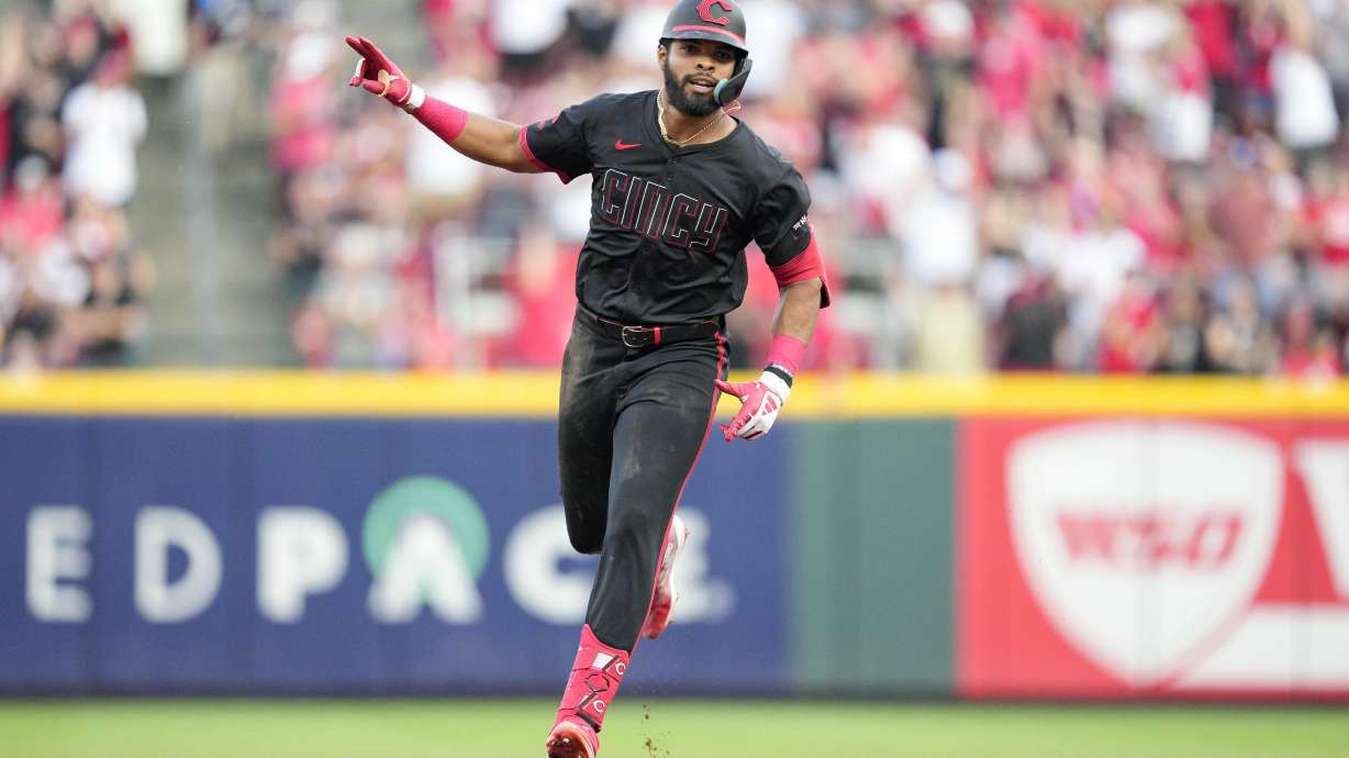 Cincinnati Reds' Rece Hinds rounds the bases after hitting his career first MLB grand slam during the third inning of a baseball game against the Miami Marlins, Friday, July 12, 2024, in Cincinnati.