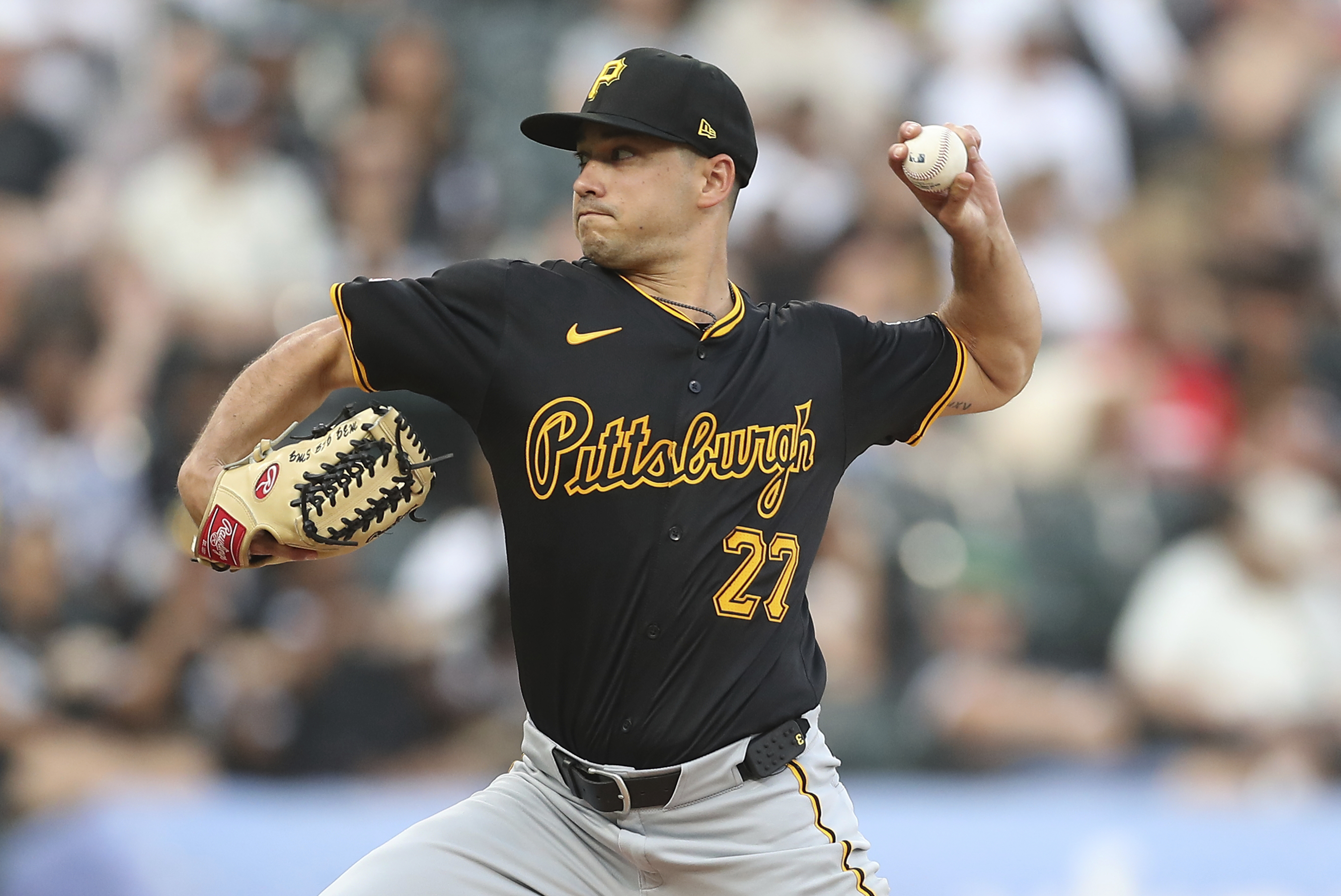 Pittsburgh Pirates' Marco Gonzales throws during the first inning of a baseball game against the Chicago White Sox, Friday, July 12, 2024, in Chicago. 