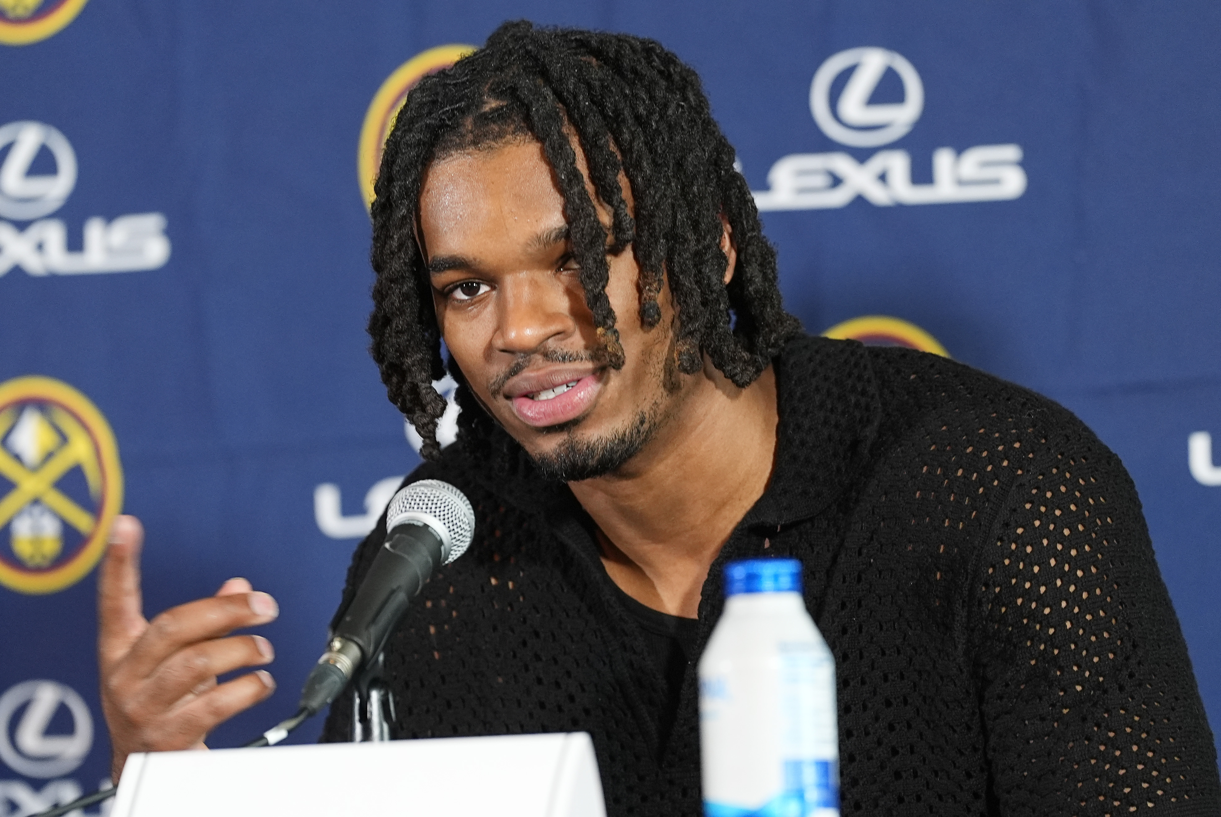 Denver Nuggets 2024 first-round draft pick DeRon Holmes II speaks during an NBA basketball news conference Monday, July 1, 2024, in Denver. 