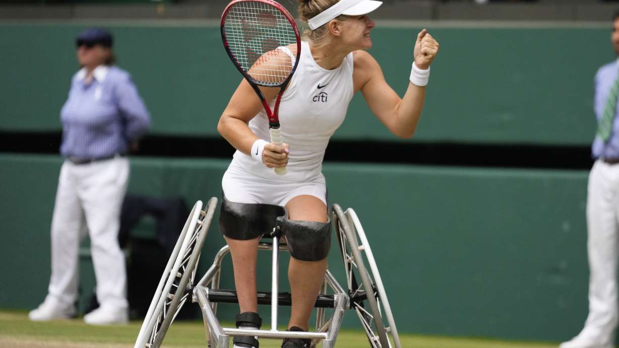 Diede De Groot of the Netherlands celebrates after defeating compatriot Aniek Van Koot in the women's wheelchair final at the Wimbledon tennis championships in London, Saturday, July 13, 2024.