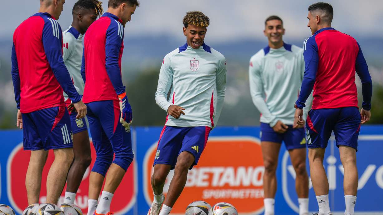 Spain's Lamine Yamal, center, takes part in a training session next to his teammates ahead of Sunday's Euro 2024, final soccer match against England in Donaueschingen, Germany, Saturday, July 13, 2024.