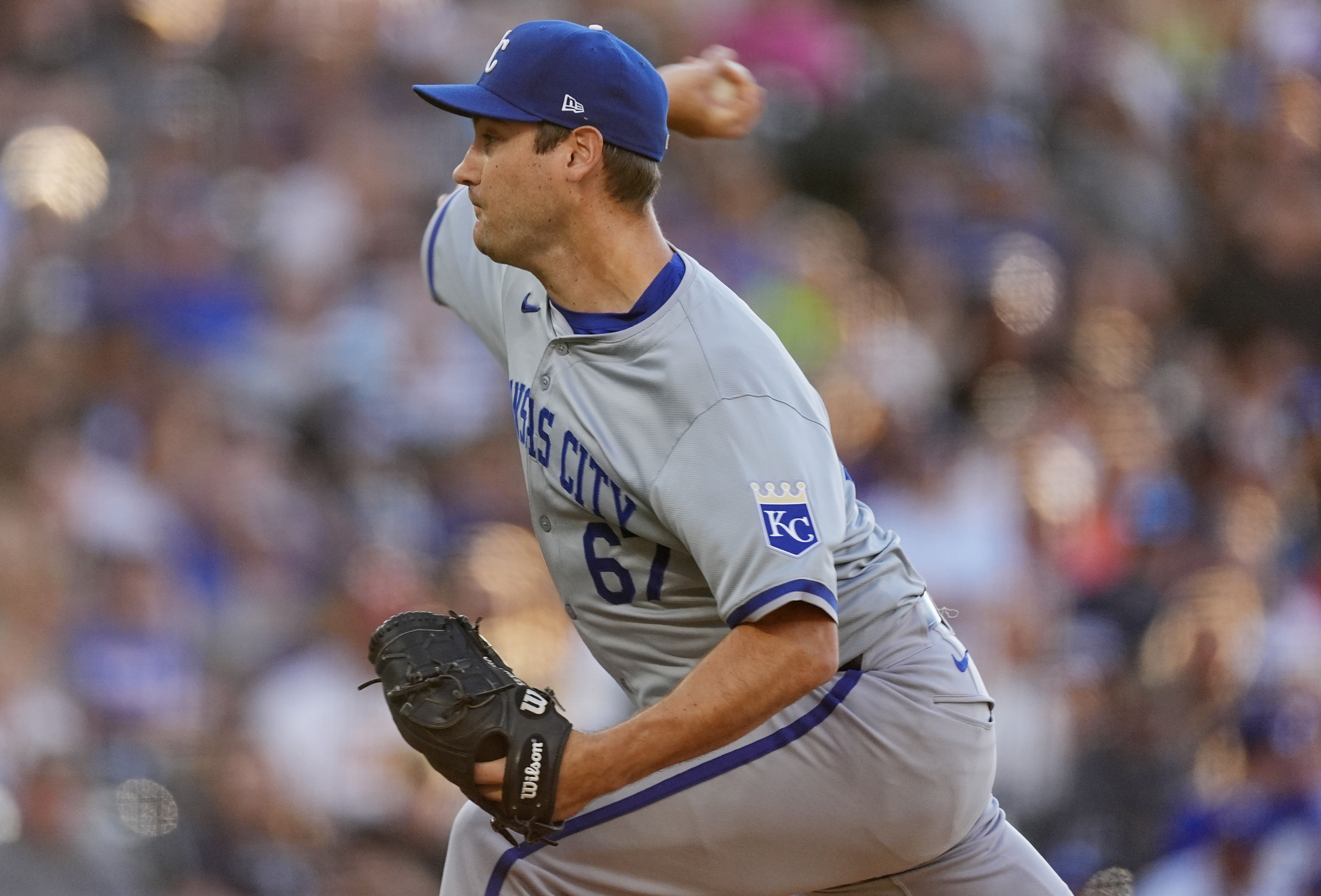 Kansas City Royals starting pitcher Seth Lugo works against the Colorado Rockies in the first inning of a baseball game Saturday, July 6, 2024, in Denver.