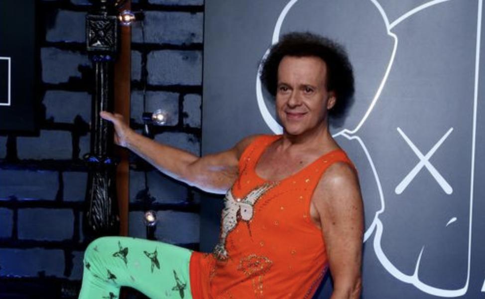 Richard Simmons arrives at the 2013 MTV Video Music Awards in New York, Aug. 25, 2013. Simmons, the perennial 1980s workout personality who was defined by his uplifting spirit, has died, according to multiple reports.