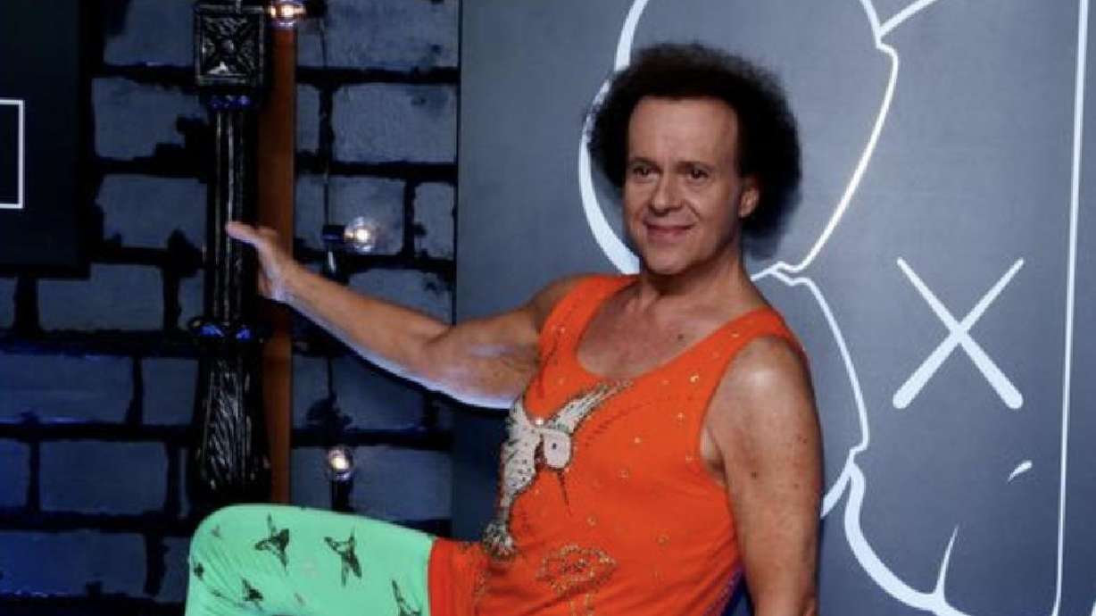 Richard Simmons arrives at the 2013 MTV Video Music Awards in New York, Aug. 25, 2013. Simmons, the perennial 1980s workout personality who was defined by his uplifting spirit, has died, according to multiple reports.