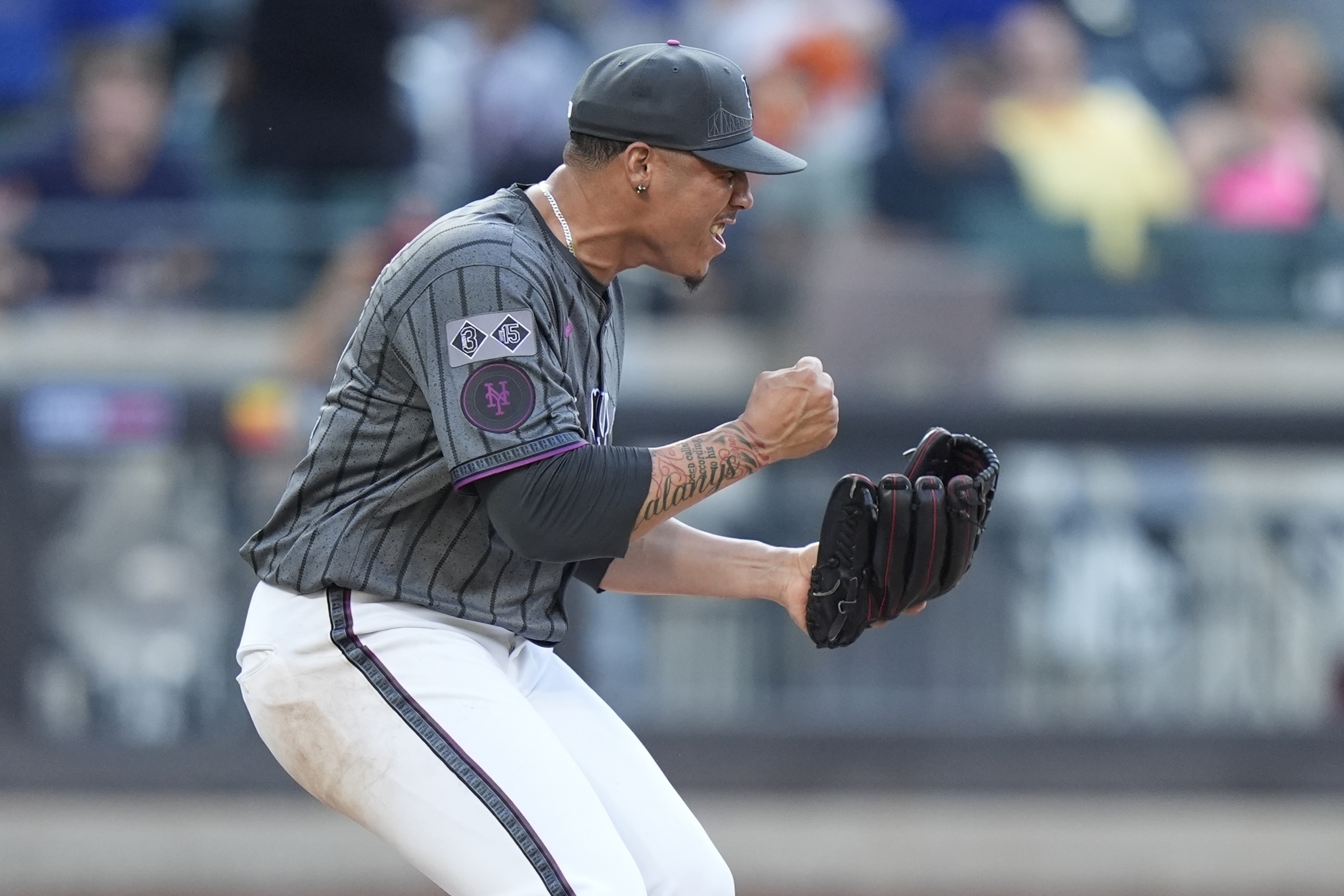 New York Mets pitcher Dedniel Núñez celebrates after a baseball game against the Colorado Rockies, Saturday, July 13, 2024, in New York. The Mets won 7-3. 