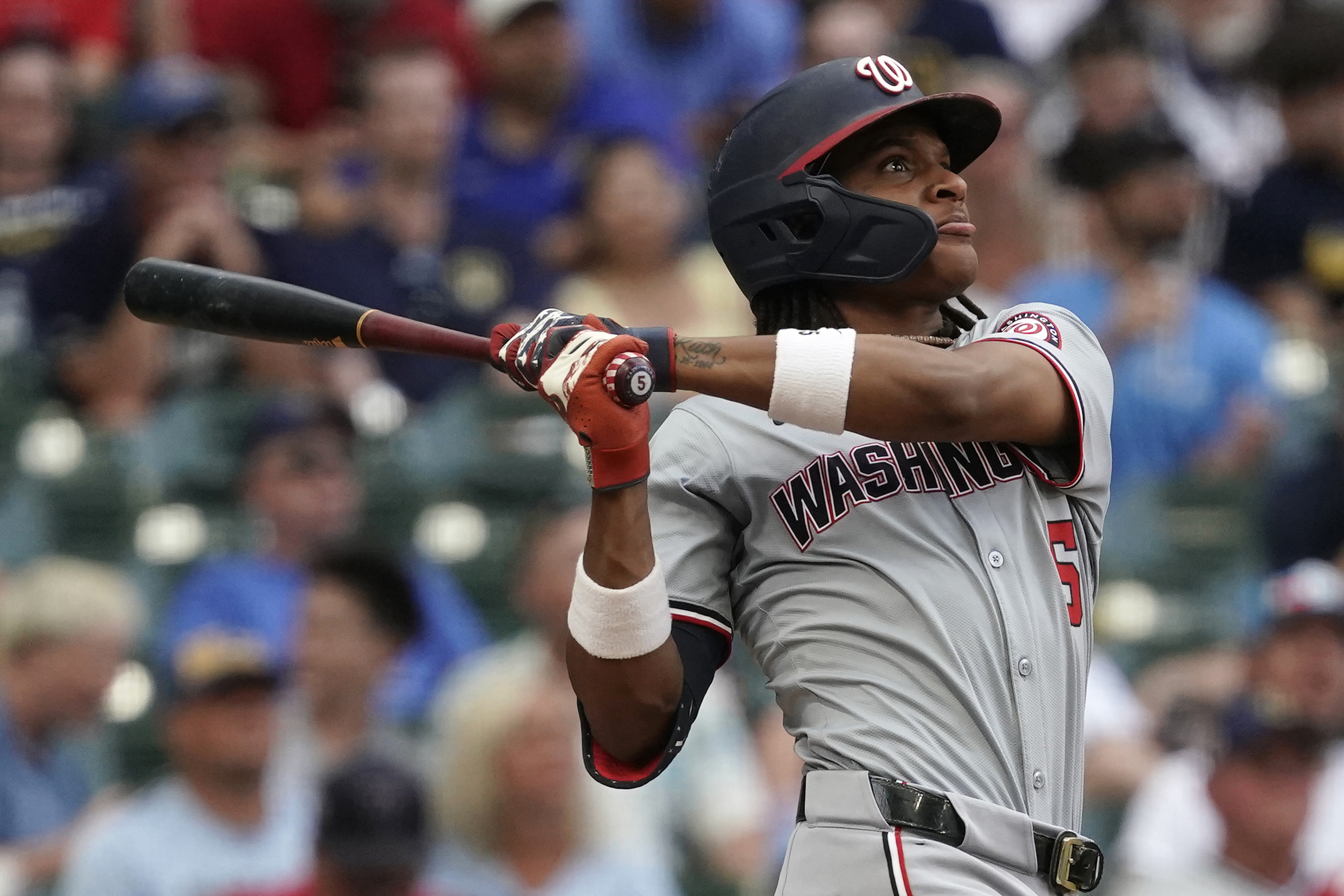 Washington Nationals' CJ Abrams hits a two-run home run during the ninth inning of a baseball game against the Milwaukee Brewers, Saturday, July 13, 2024, in Milwaukee. 