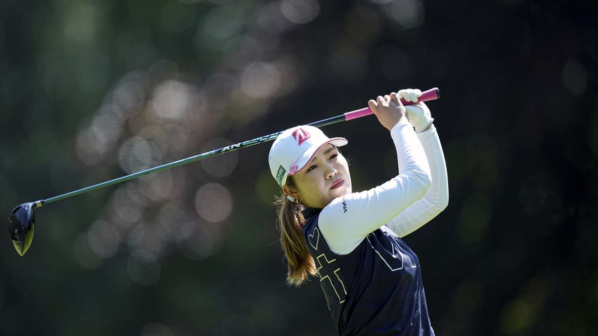 Ayaka Furue, of Japan, plays on the fourth hole during the last round of the Evian Championship women's golf tournament, in Evian, eastern France, Sunday, July 14, 2024.