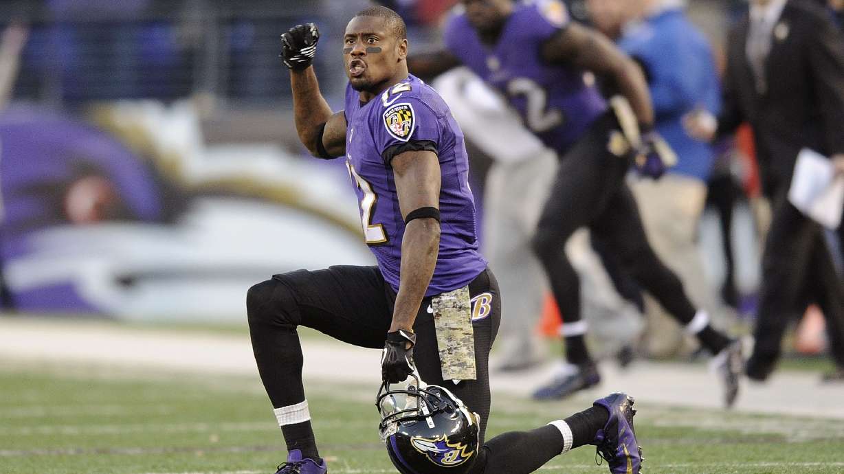 FILE - In this Nov. 10, 2013 file photo, Baltimore Ravens wide receiver Jacoby Jones cheers in overtime of an NFL football game against the Cincinnati Bengals in Baltimore. The Houston Texans, Jones' team for the first five seasons of his career, announced his death Sunday, July 14, 2024. He was 40.