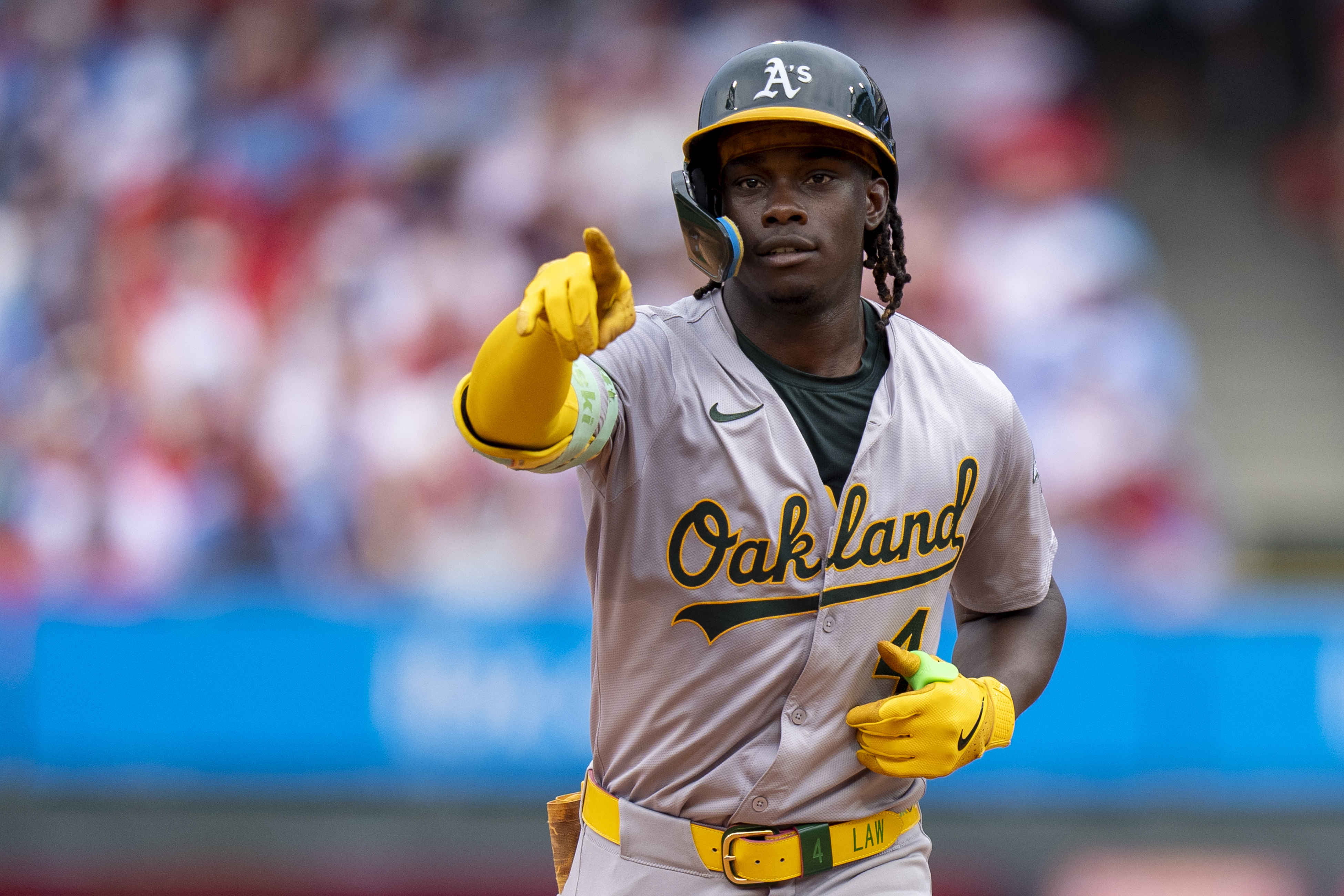 Oakland Athletics' Lawrence Butler reacts to his two-run home run during the fifth inning of a baseball game against the Philadelphia Phillies, Sunday, July 14, 2024, in Philadelphia. 