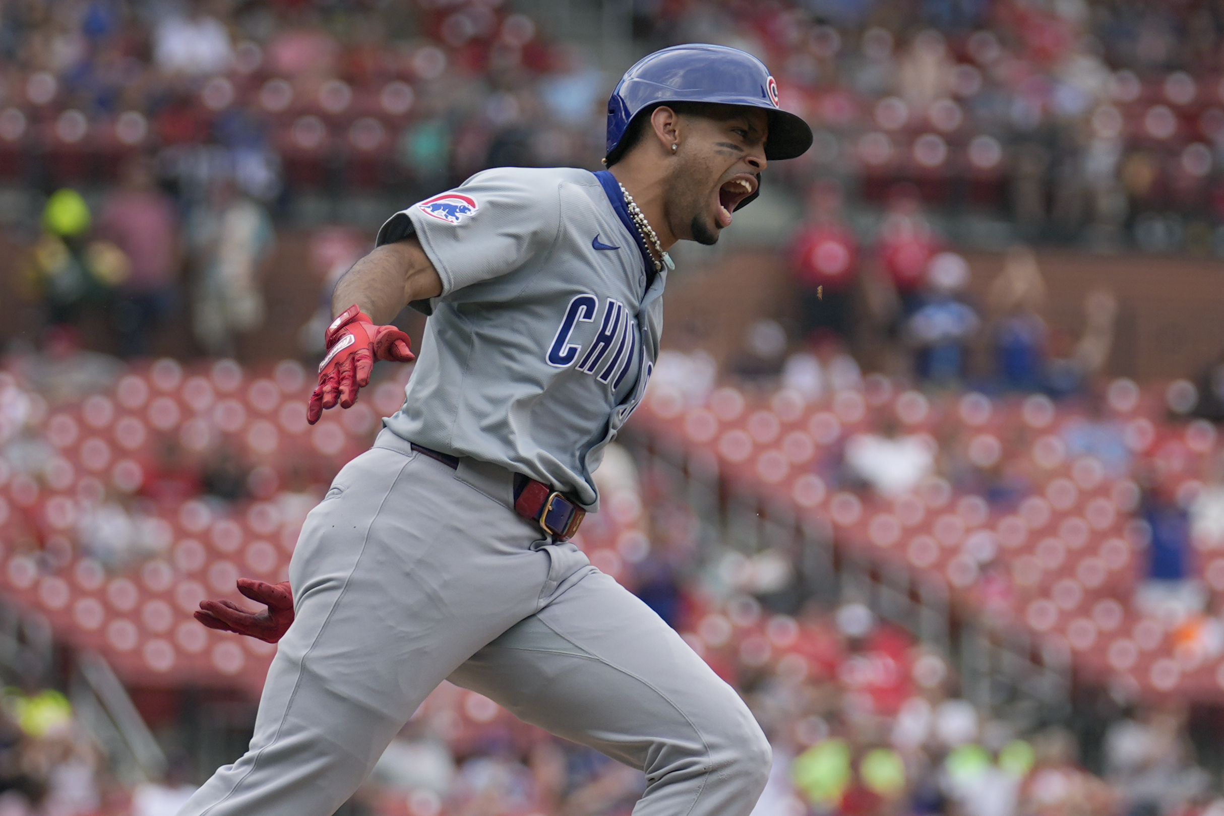 Chicago Cubs' Christopher Morel rounds the bases after hitting a solo home run during the eighth inning of a baseball game against the St. Louis Cardinals Sunday, July 14, 2024, in St. Louis. 