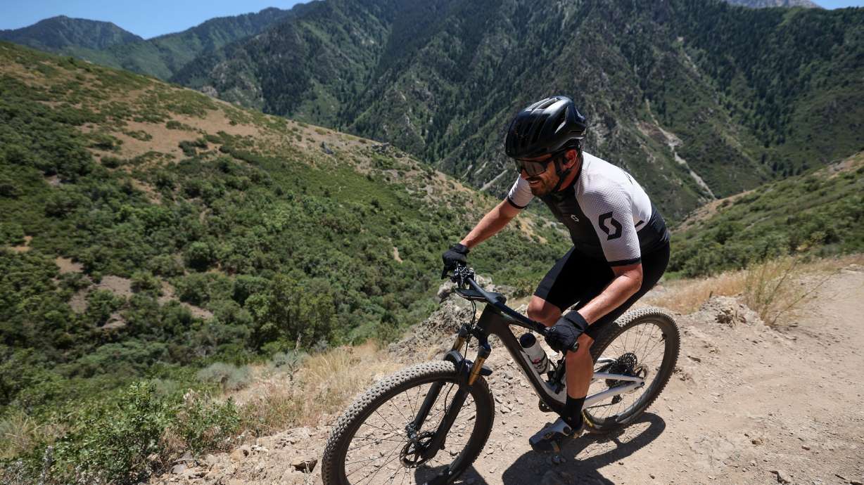 Paracyclist Steven Wilke rides from Rattlesnake Gulch to the Pipeline Overlook Trail to Bonneville Shoreline Trail Grandeur Peak in Millcreek Canyon on July 8.
