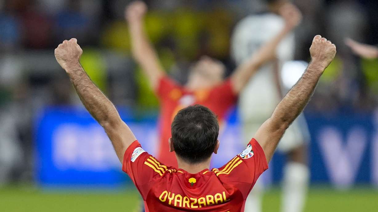 Spain's Mikel Oyarzabal celebrates after winning the final match against England at the Euro 2024 soccer tournament in Berlin, Germany, Sunday, July 14, 2024.