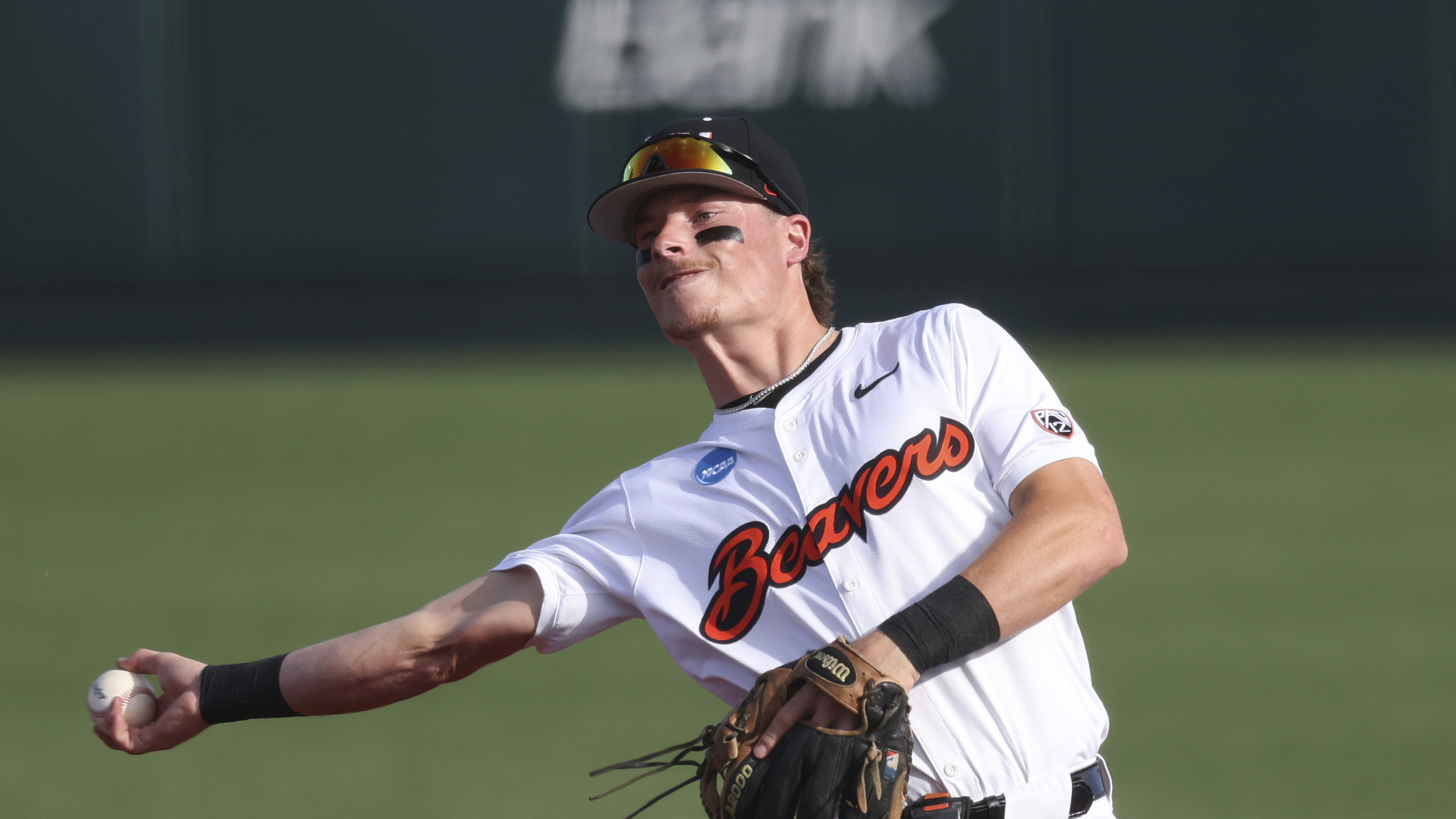 FILE - Oregon State infielder Travis Bazzana plays during an NCAA regional baseball game against Tulane on May 31, 2024, in Corvallis, Ore. Bazzana was taken by the Cleveland Guardians on Sunday, July 14, 2024, with the top pick in Major League Baseball’s amateur draft. 
