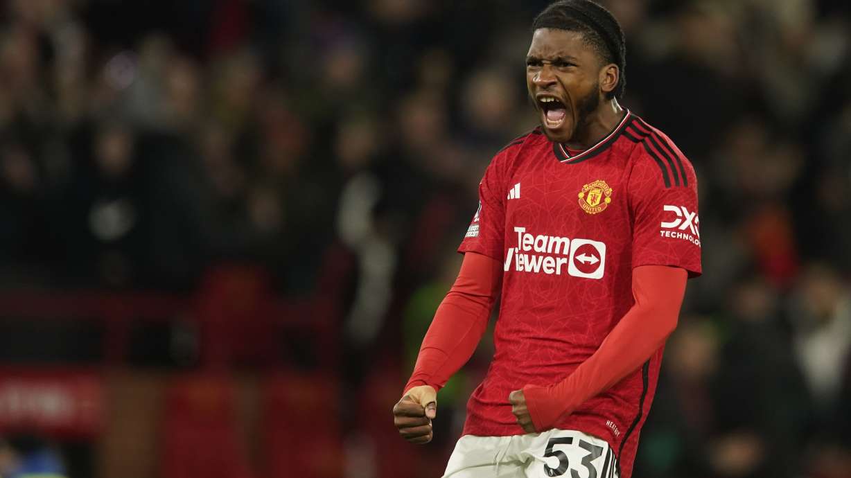 FILE - Willy Kambwala celebrates during the English Premier League soccer match between Manchester United and Aston Villa in Manchester, England, Tuesday, Dec. 26, 2023. Willy Kambwala joined Villarreal from Manchester United on Monday after agreeing a five-year contract.