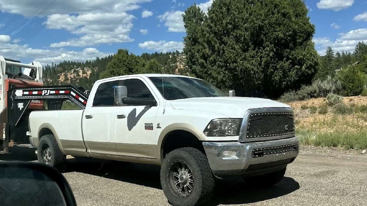 A white Dodge Ram 2500 Heavy-Duty pickup truck was recently spotted hauling a stolen historic half-track through Kane County, U.S. Forest Service officials said Monday.