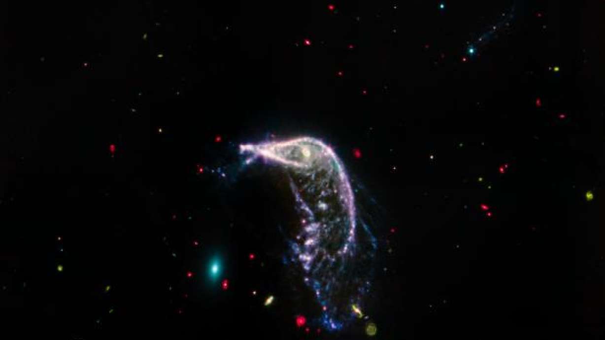 A new image captured by the James Webb Space Telescope and released Friday depicts two merging galaxies, collectively known as Arp 142 and nicknamed "the Penguin and the Egg."