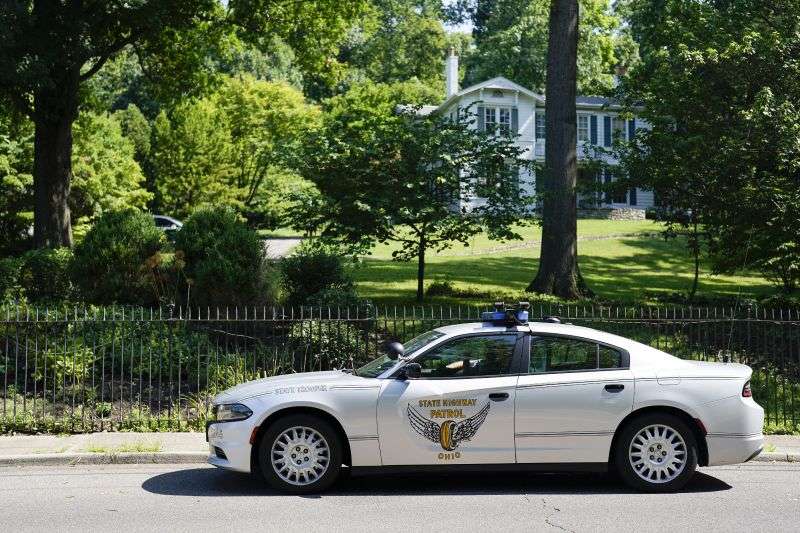Security vehicles are parked outside the home of Ohio Sen. JD Vance, who Donald Trump chose as his nominee for vice president, Monday in Cincinnati.