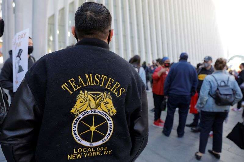 A person wearing a patch of the International Brotherhood of Teamsters labor union attends a May Day rally for media workers held by The NewsGuild of New York on International Workers' Day in Manhattan, New York City May 1, 2021.