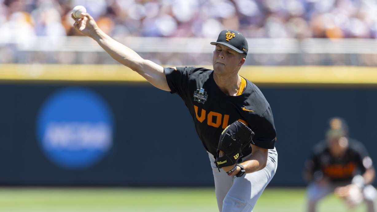 Tennessee starting pitcher Drew Beam throws against Texas A&M in the first inning of Game 2 of the NCAA College World Series baseball finals in Omaha, Neb., Sunday, June 23, 2024.