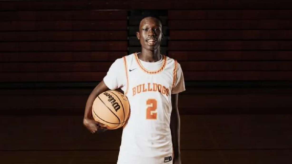 Nuer Deng, 17, a student at Judge Memorial Catholic High School, was shot and killed while sitting in a car parked in a West Valley parking lot last month. Police say he was an innocent bystander. Two people have been charged with killing him.