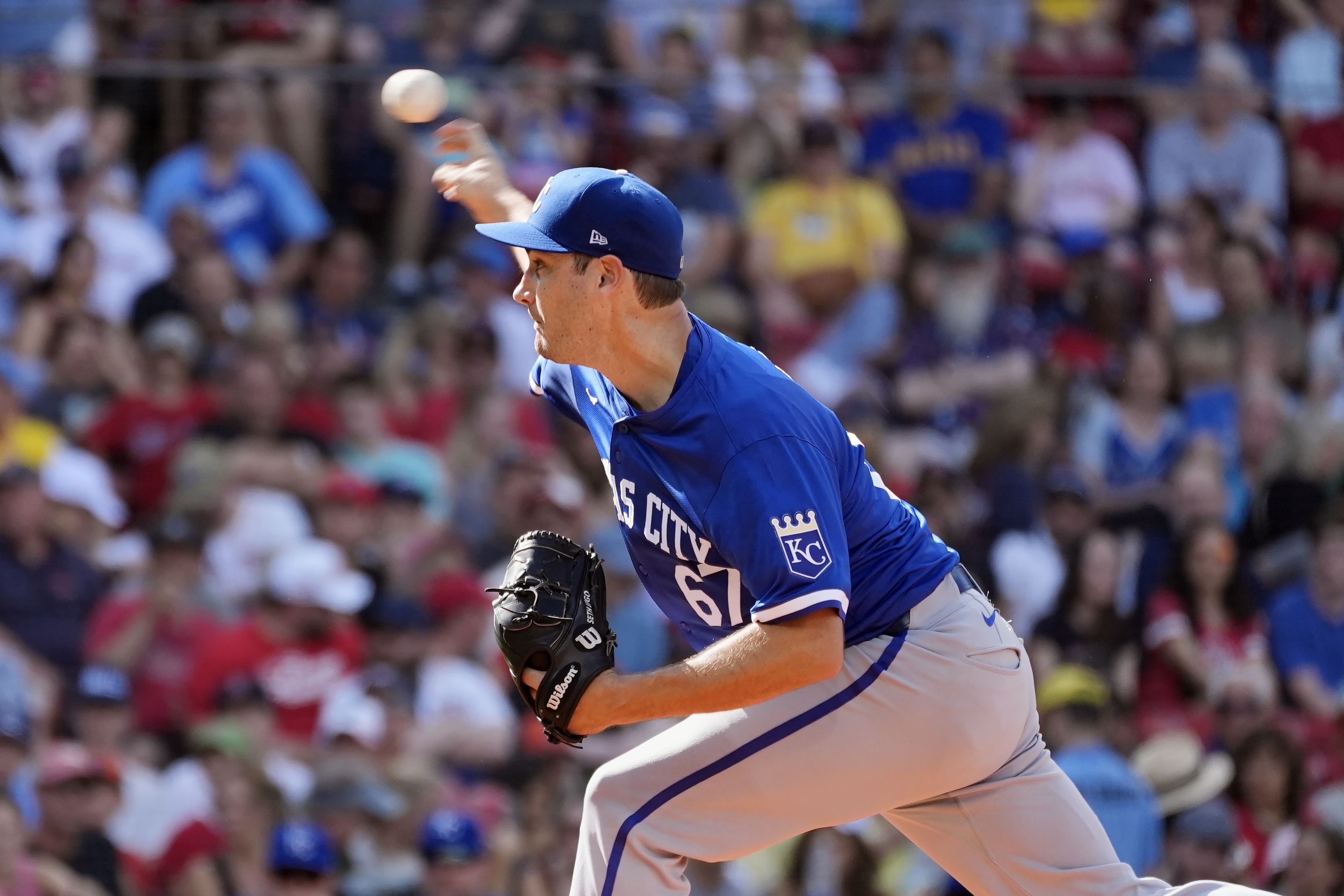 Kansas City Royals starting pitcher Seth Lugo throws against the Boston Red Sox during the first inning of a baseball game, Saturday, July 13, 2024, in Boston. 