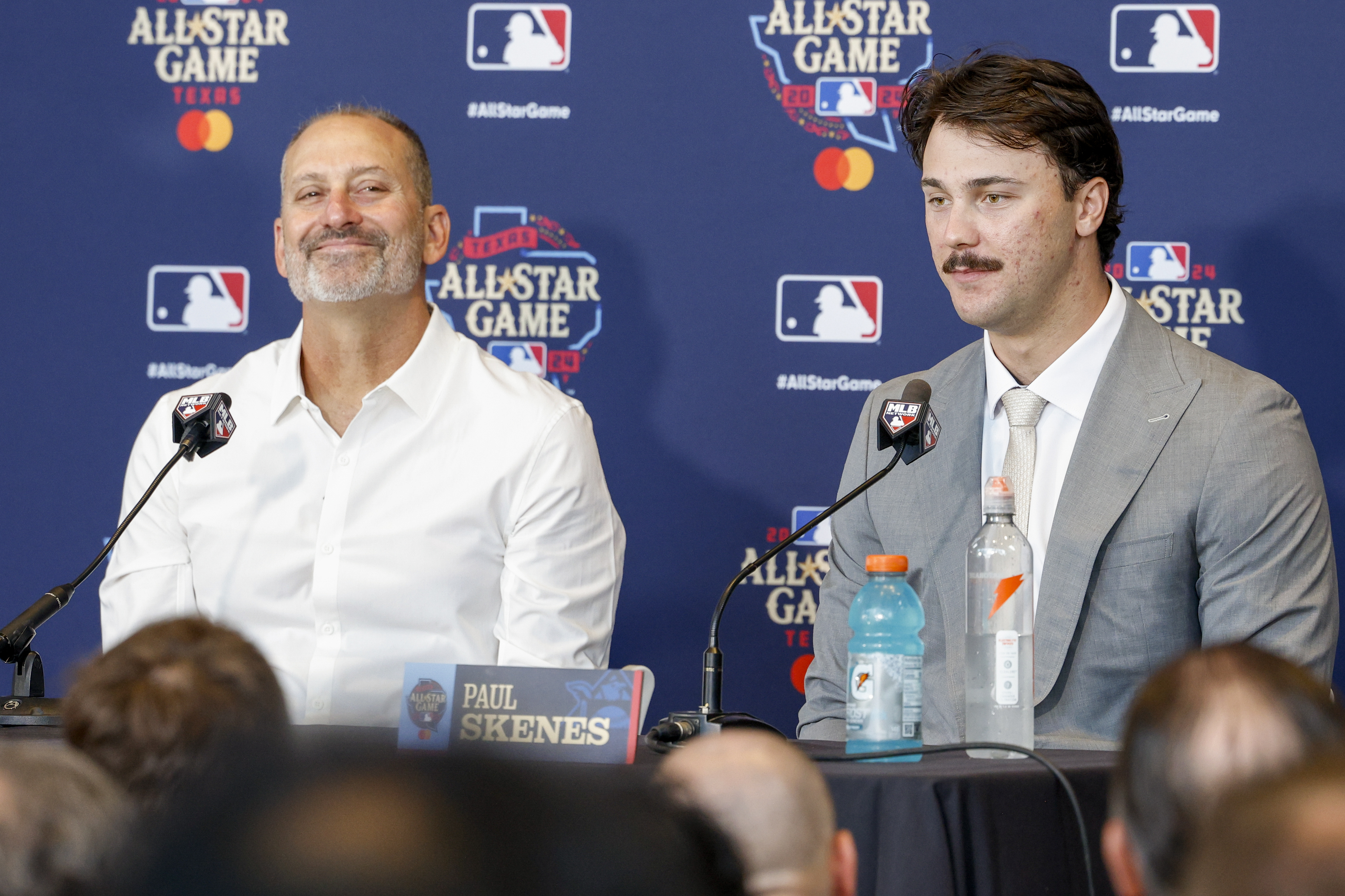 Arizona Diamondbacks and National League manager Torey Lovullo, left, smiles as Pittsburgh Pirates pitcher Paul Skenes, right, speaks during MLB baseball All-Star Game media day Monday, July 15, 2024, in Arlington, Texas. 