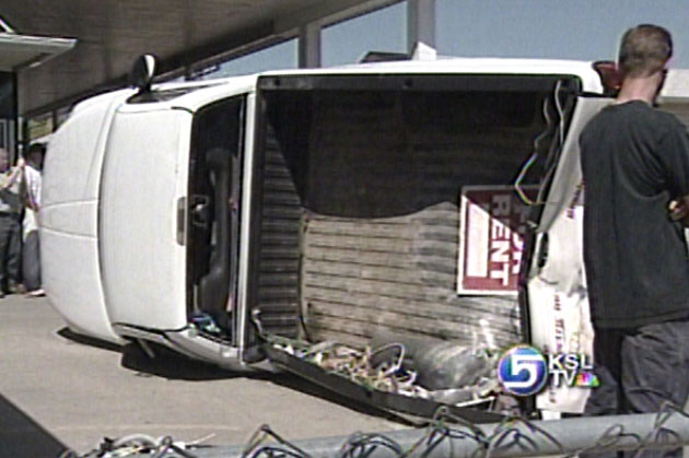 Truck Rolls Over Onto Body Shop Parking Lot