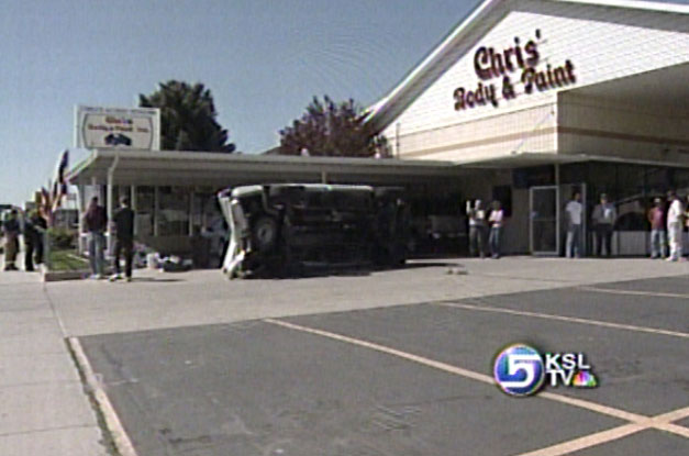 Truck Rolls Over Onto Body Shop Parking Lot