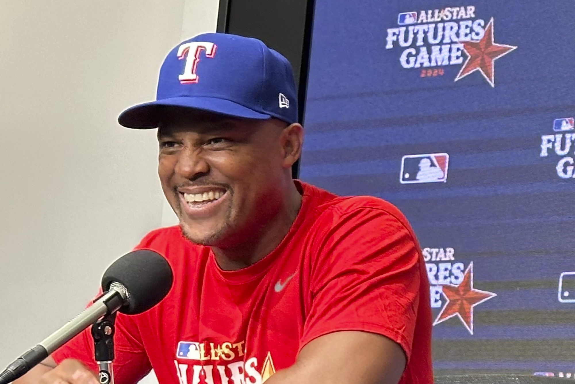 Adrián Beltré speaks to reporters on Saturday, July 13, 2024, before managing in the MLB Futures Game in Arlington, Texas. The former Rangers third baseman is an ambassador for the All-Star Game and will be inducted into baseball's Hall of Fame in Cooperstown, N.Y., on Sunday, July 21.
