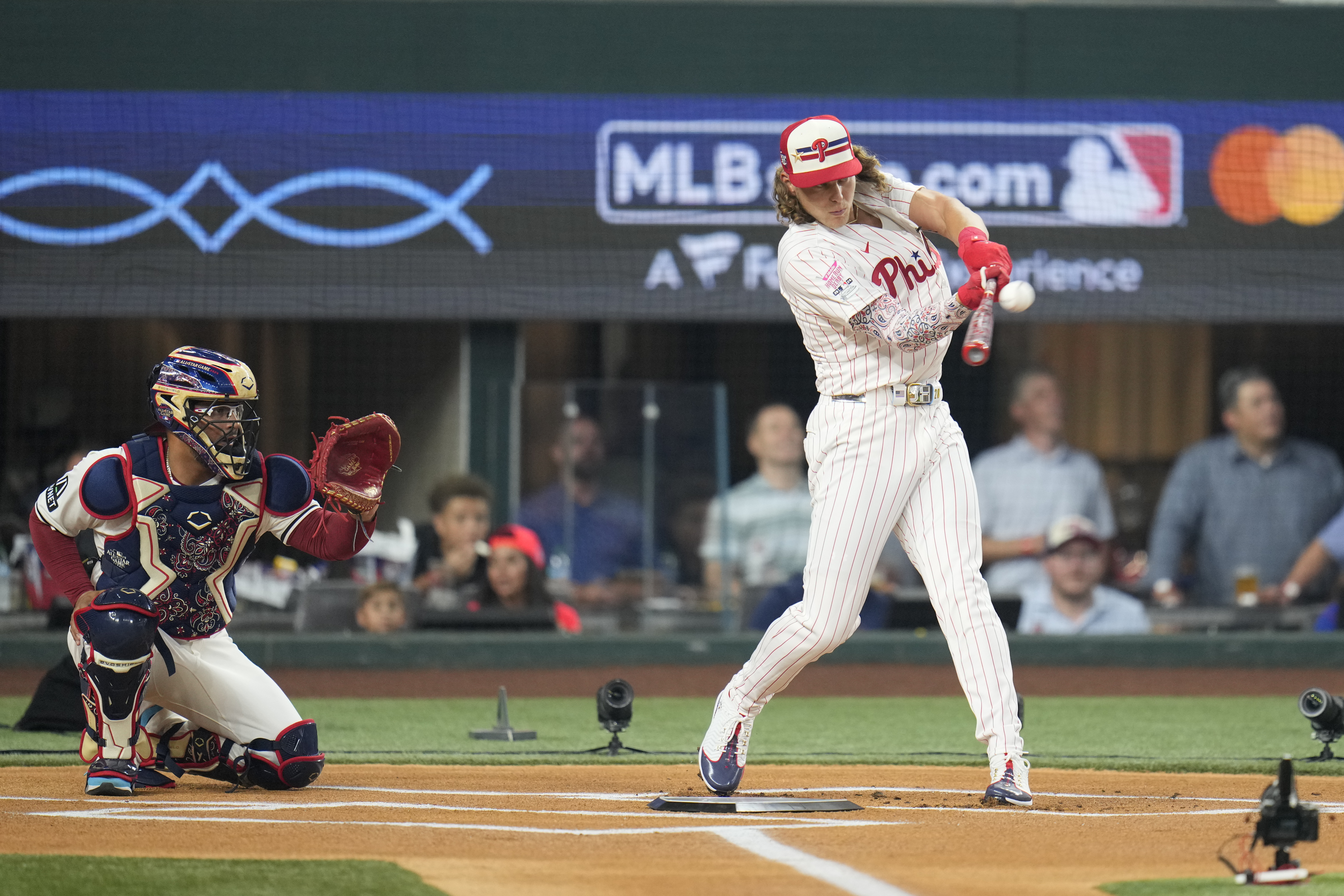 National League's Alec Bohm, of the Philadelphia Phillies, connects during the MLB baseball All-Star Home Run Derby, Monday, July 15, 2024, in Arlington, Texas. 
