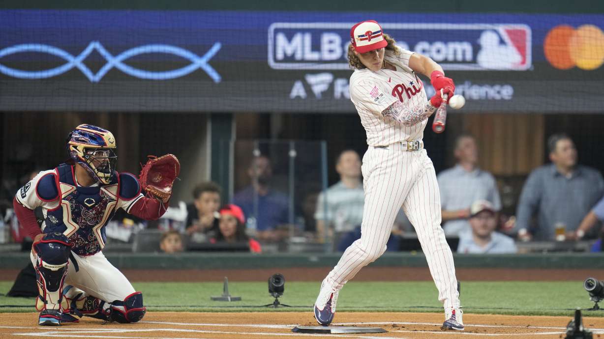 National League's Alec Bohm, of the Philadelphia Phillies, connects during the MLB baseball All-Star Home Run Derby, Monday, July 15, 2024, in Arlington, Texas.