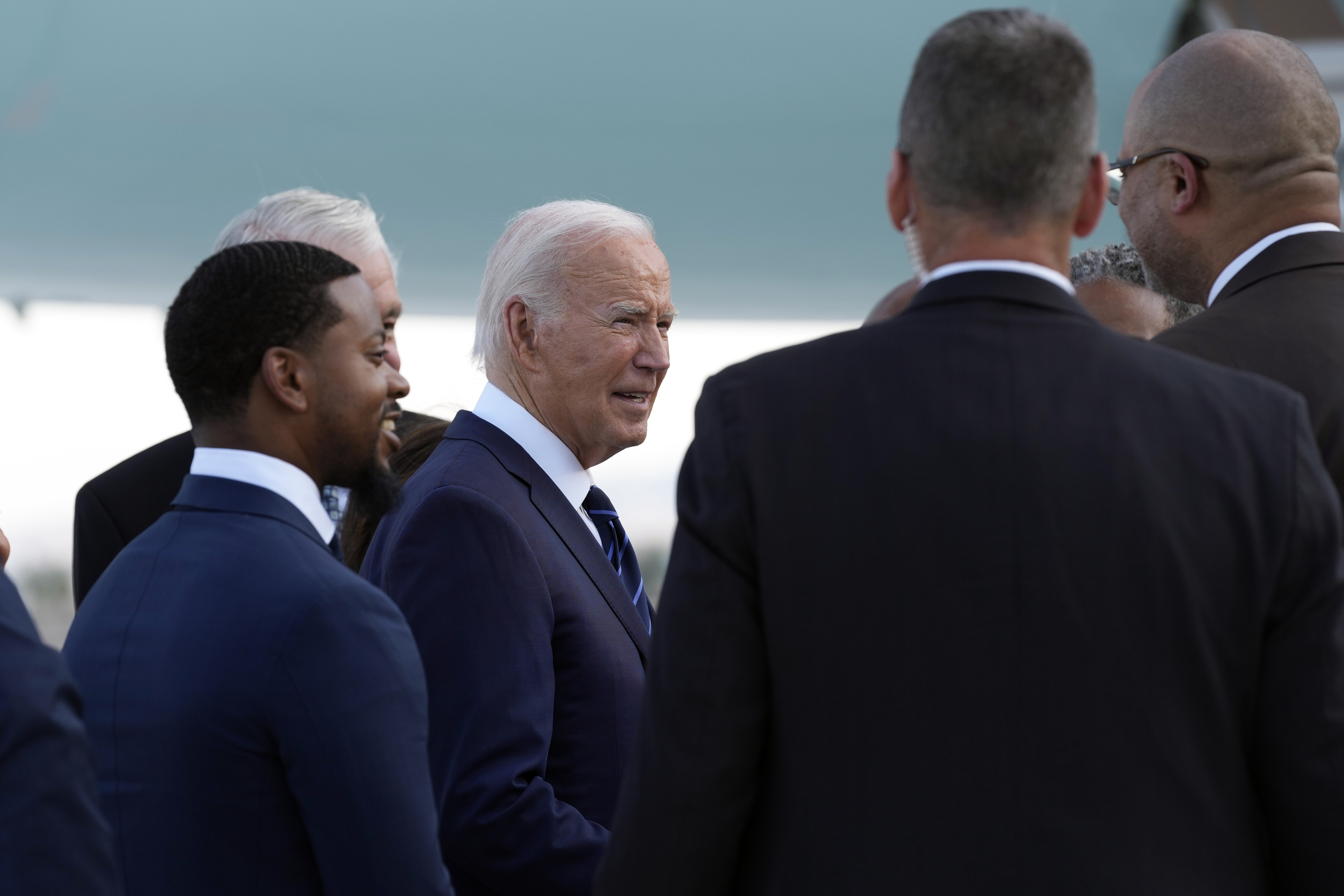 President Joe Biden greets people after arriving at Harry Reid International Airport in Las Vegas, Monday. Biden is returning to the campaign trail for the first time since the attempted assassination of his Republican rival, former President Donald Trump.
