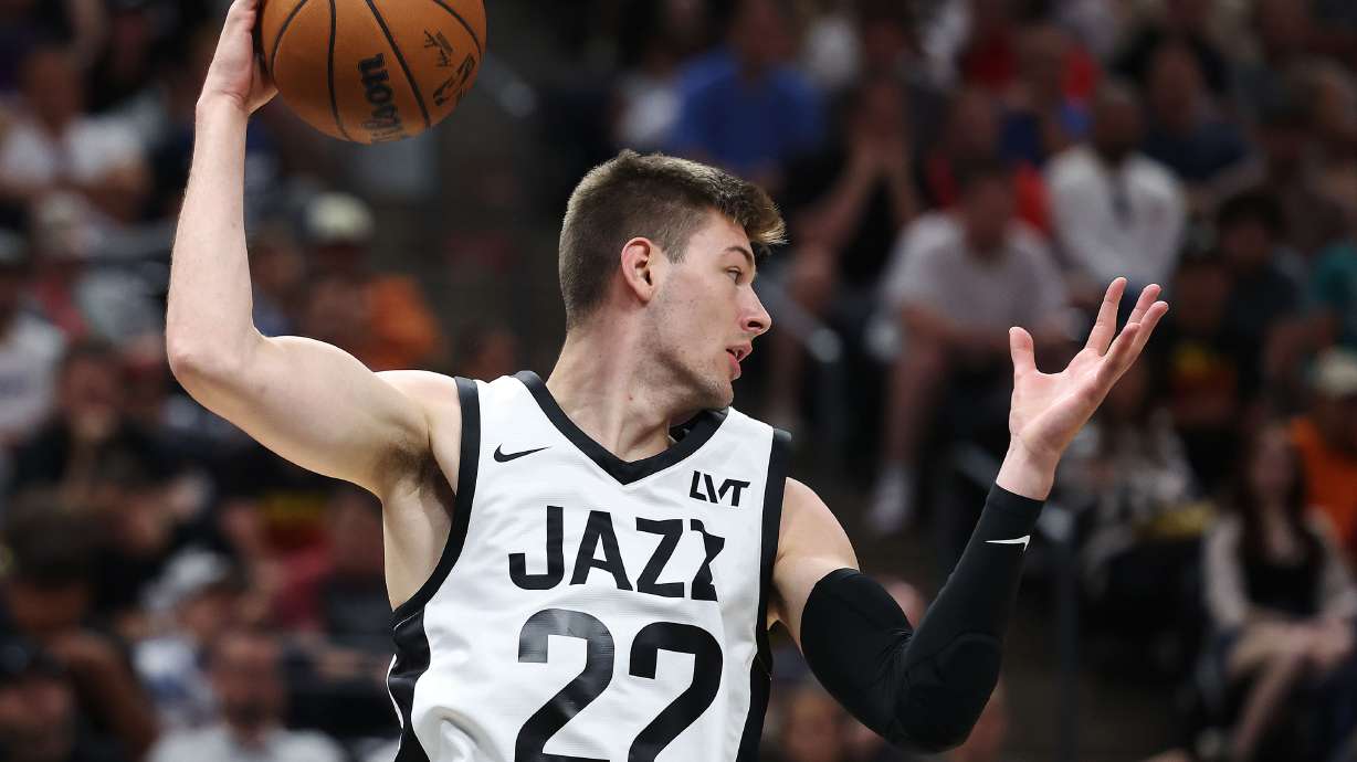 Utah Jazz forward Kyle Filipowski (22) grabs a rebound during a SLC Summer League game in Salt Lake City on Monday, July 8, 2024. The Jazz won 97-95 in overtime.