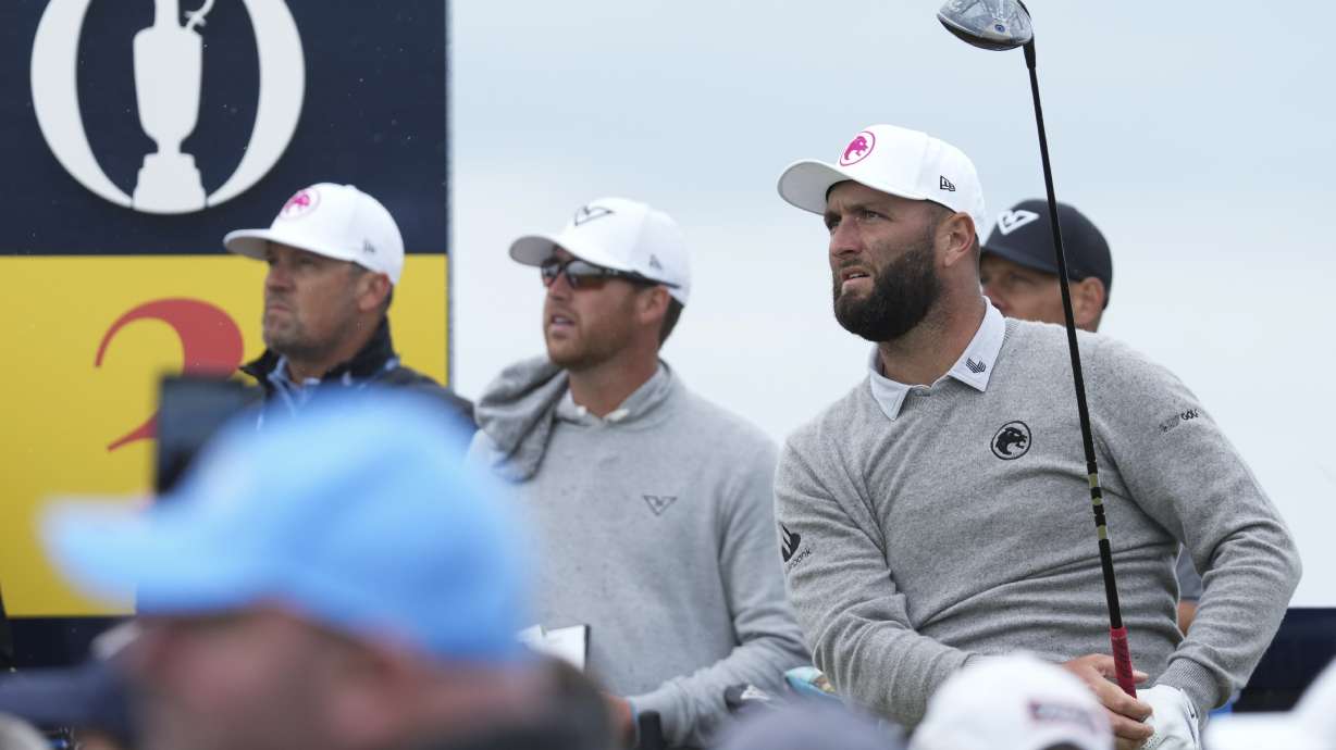 Jon Rahm of Spain watches his tee shot on the third hole during a practice round ahead of the British Open Golf Championships at Royal Troon golf club in Troon, Scotland, Tuesday, July 16, 2024.