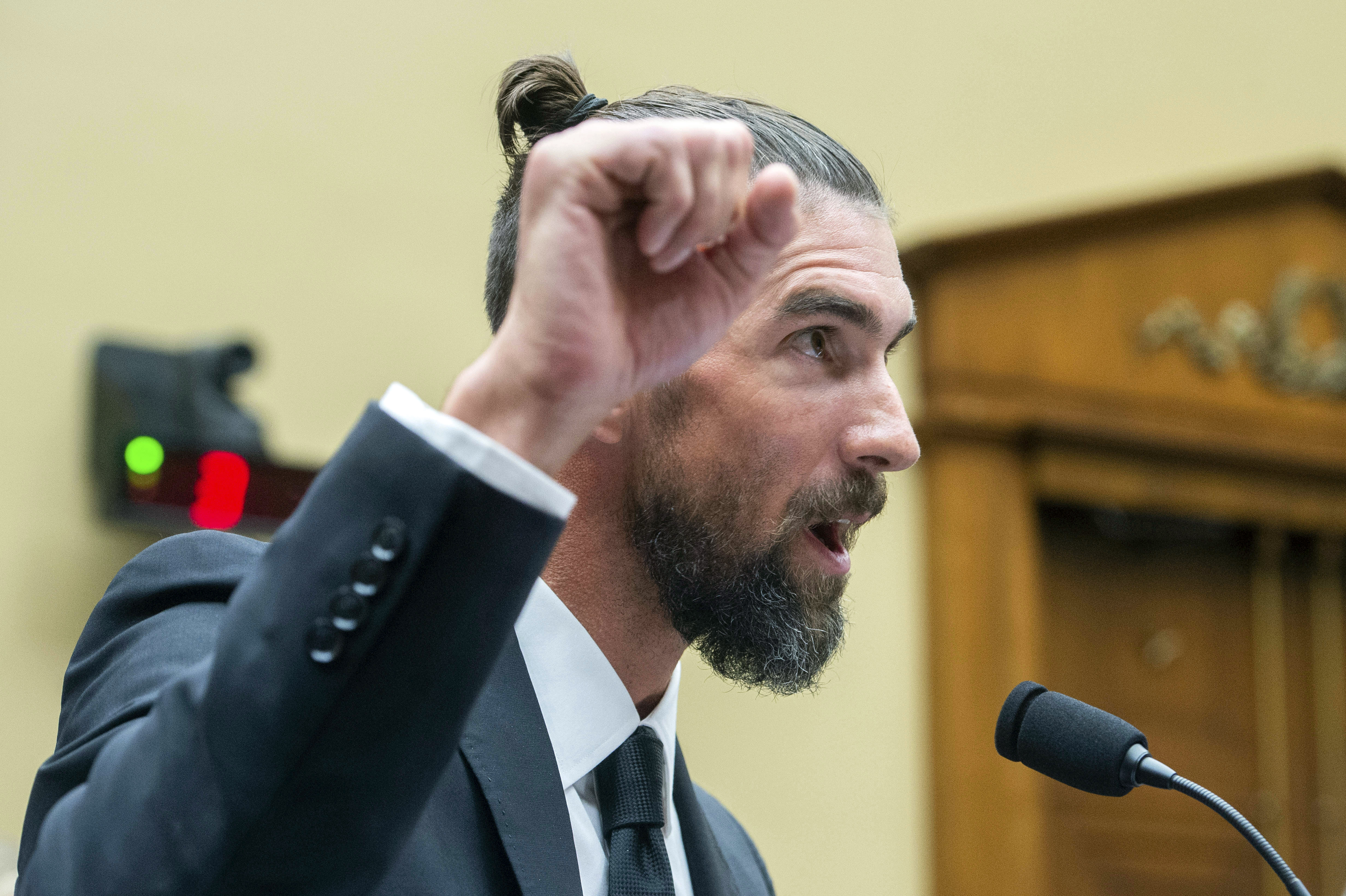 Michael Phelps, former Olympic athlete, testifies during a House Committee on Energy and Commerce Subcommittee on Oversight and Investigations hearing examining Anti-Doping Measures in Advance of the 2024 Olympics, on Capitol Hill, Tuesday, June 25, 2024, in Washington. 