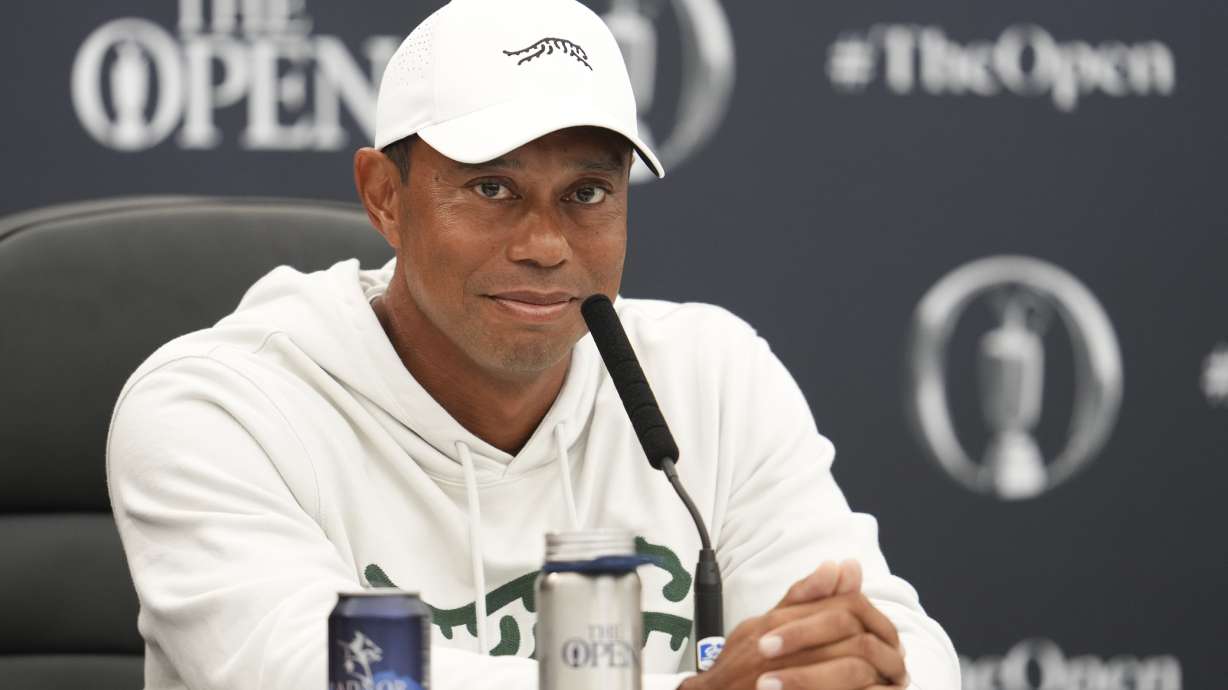 Tiger Woods of the United States answers questions at a press conference ahead of the British Open Golf Championships at Royal Troon golf club in Troon, Scotland, Tuesday, July 16, 2024.