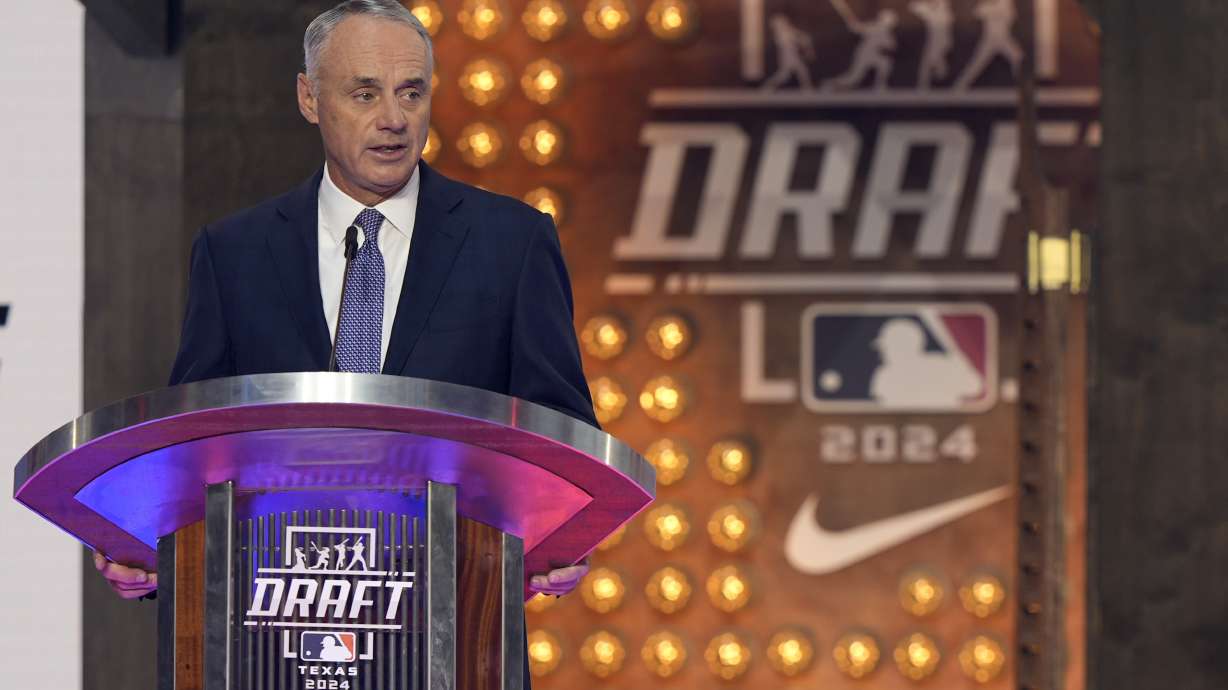 Major League Baseball Commissioner Rob Manfred makes comments during the MLB baseball draft in Fort Worth, Texas, Sunday, July 14, 2024.