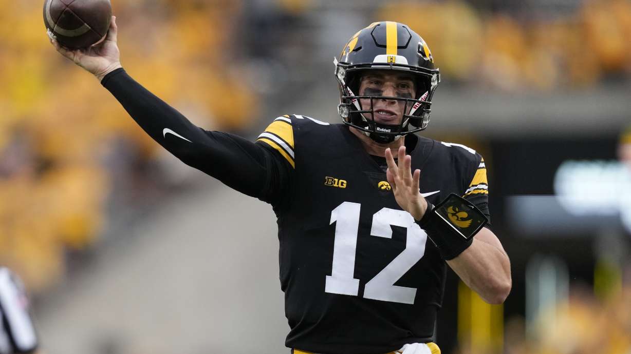 FILE - Iowa quarterback Cade McNamara throws a pass during the second half of an NCAA college football game against Western Michigan, Saturday, Sept. 16, 2023, in Iowa City, Iowa. Tim Lester has had nearly six months to come up with potential fixes for the moribund Iowa offense, but the key for the Hawkeyes’ new offensive coordinator might be just having a healthy starting quarterback. That should be McNamara, who started five games last season before a knee injury and subsequent surgery sidelined him for the rest of the year.