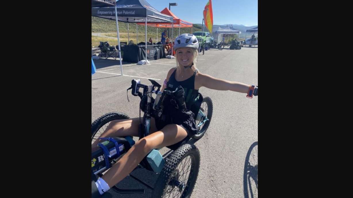 Emily Traveller, who was paralyzed in an ATV accident in 2022, rides an arm cycle at the Summit Challenge Race in Park City in summer 2023.
